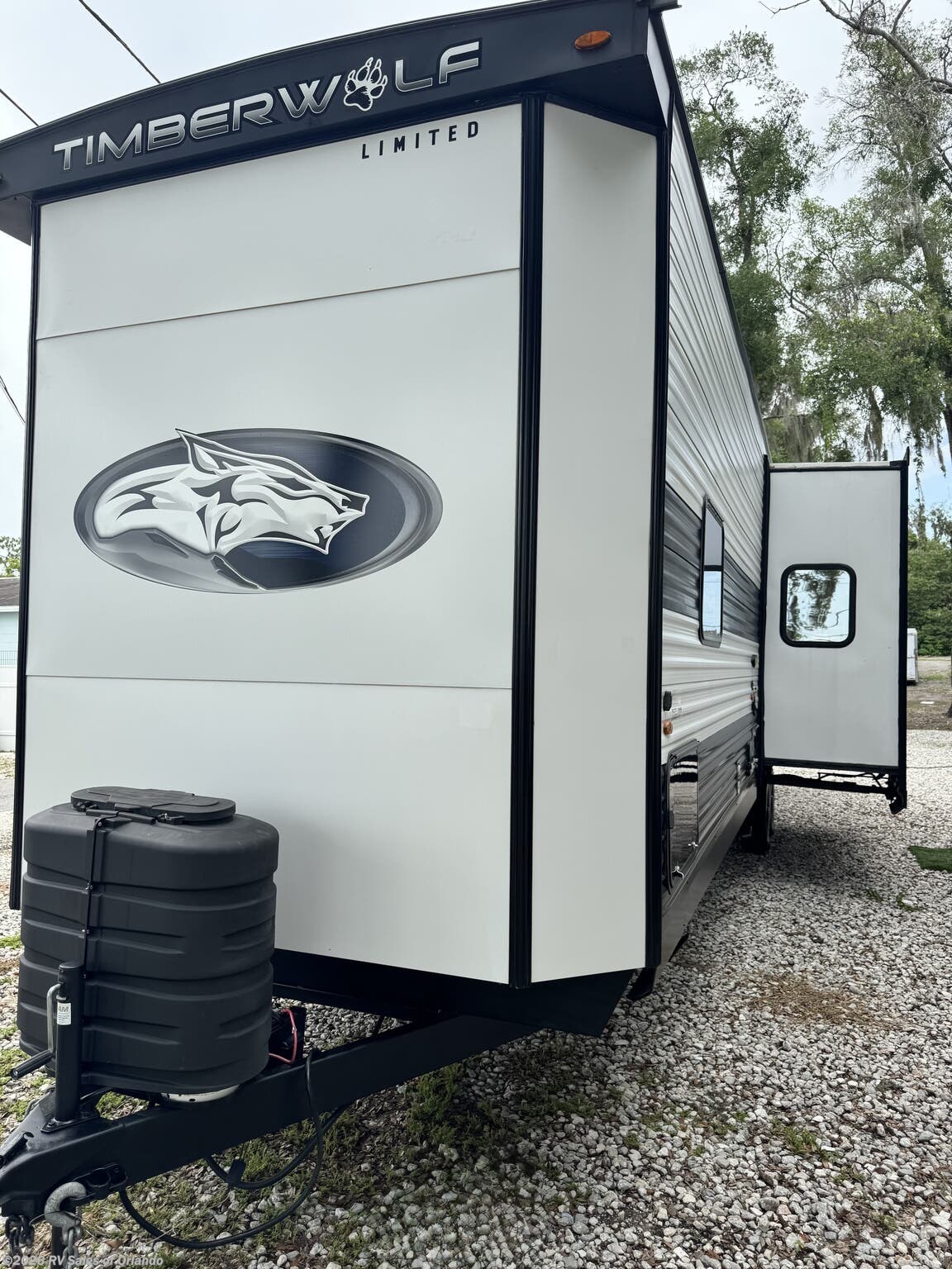 2024 Forest River Cherokee Timberwolf 39TN - Used Park Model For Sale by RV Sales of Orlando in Longwood, Florida features Fireplace, Kitchen Sink, Backup Camera, Air Conditioning, Awning