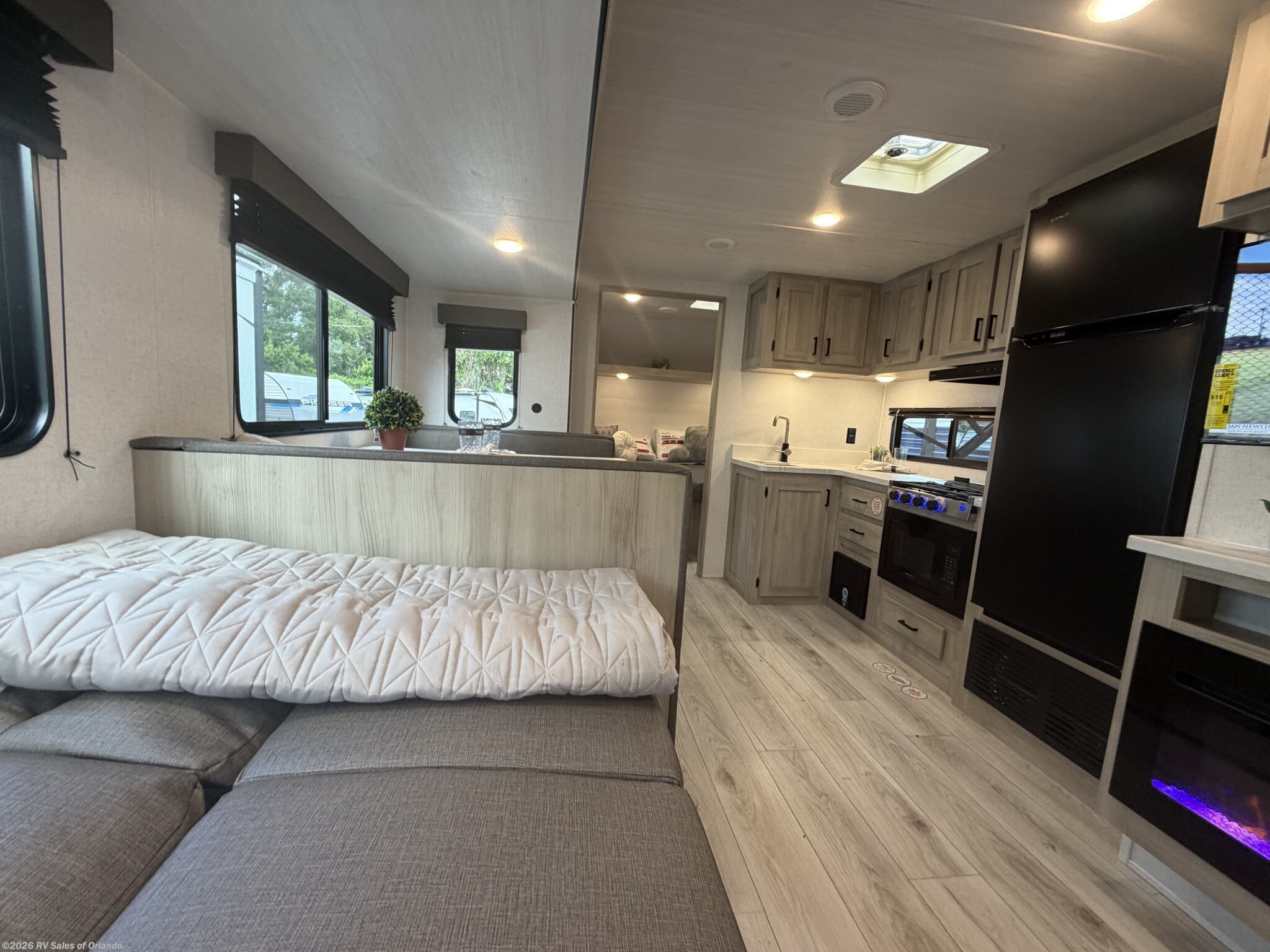 2025 East to West Silver Lake 2600RB - Used Travel Trailer For Sale by RV Sales of Orlando in Longwood, Florida features Fireplace, Awning, Solar Prep, Detachable Power Cord, Black Tank Flush
