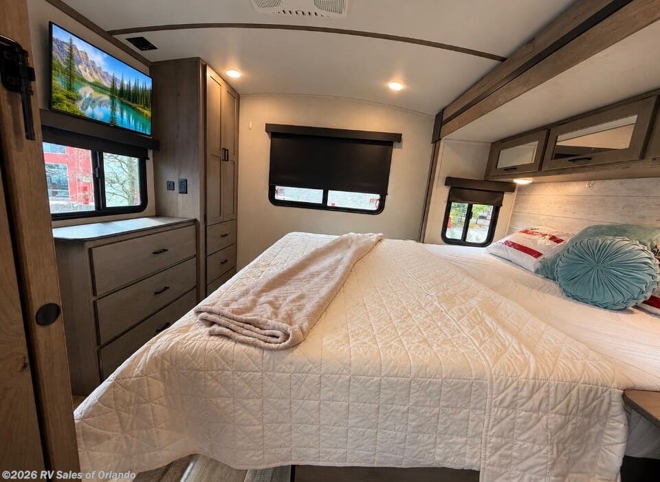 2021 Keystone Outback 342CG - Used Travel Trailer For Sale by RV Sales of Orlando in Longwood, Florida features Skylight, Ladder, Power Awning, Stereo System, TV