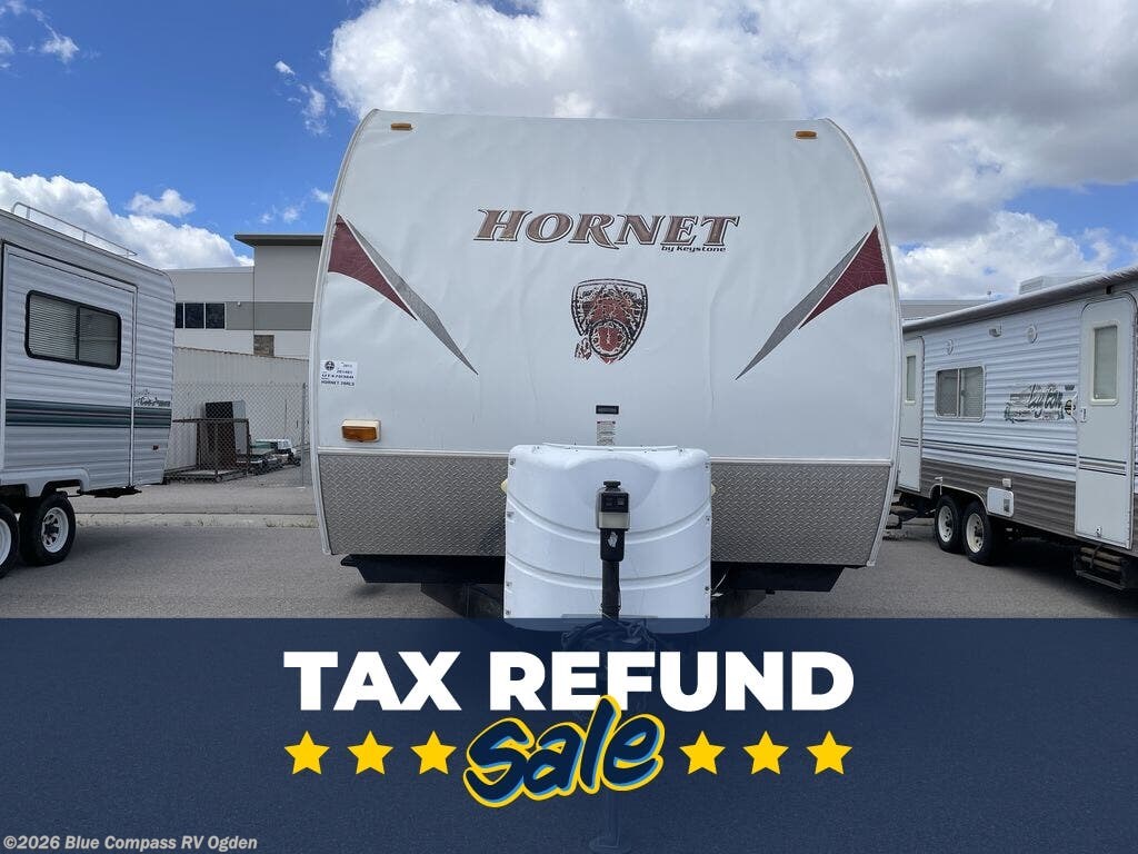 2011 Keystone Hornet 28RLS - Used Travel Trailer For Sale by Blue Compass RV Ogden in Marriott-Slaterville, Utah features Slideout