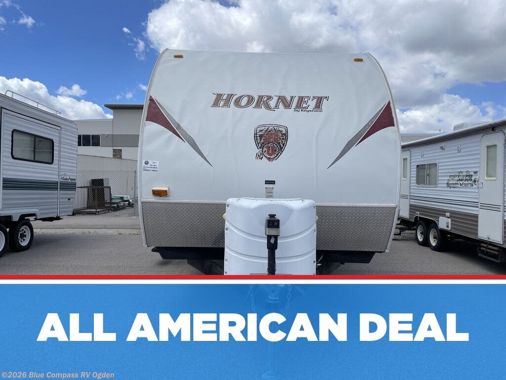 2011 Keystone Hornet 28RLS - Used Travel Trailer For Sale by Blue Compass RV Ogden in Marriott-Slaterville, Utah features Slideout