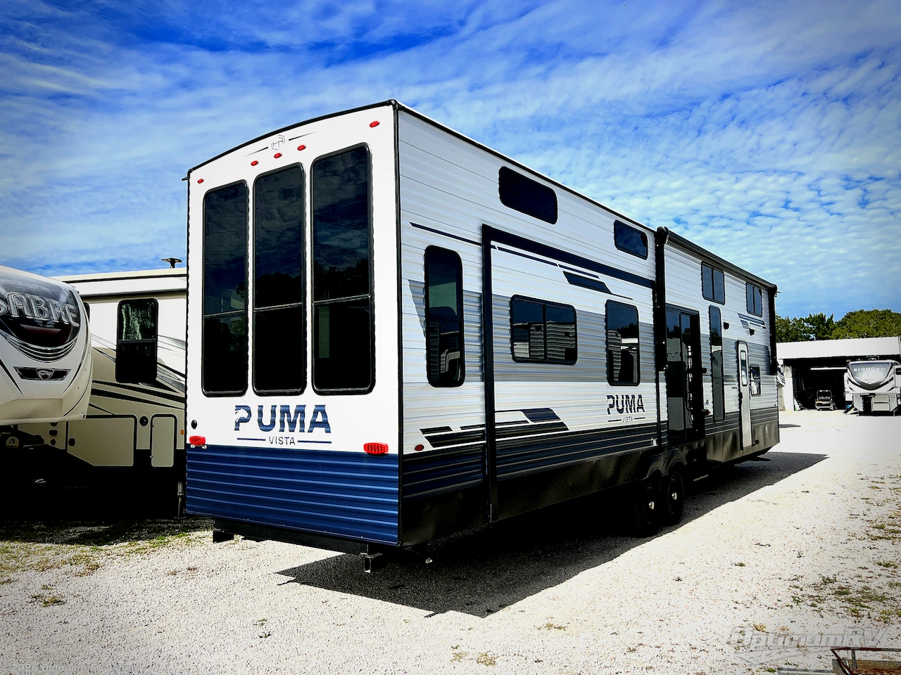 2026 Forest River Puma Vista 401RLFT - New Destination Trailer For Sale by Optimum RV - Mims in Mims, Florida features Awning, Slideout