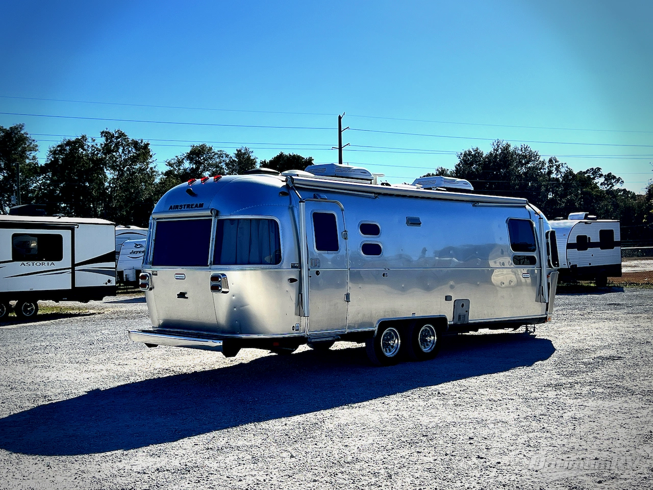 2022 Airstream International 27FB - Used Travel Trailer For Sale by Optimum RV - Mims in Mims, Florida features Awning