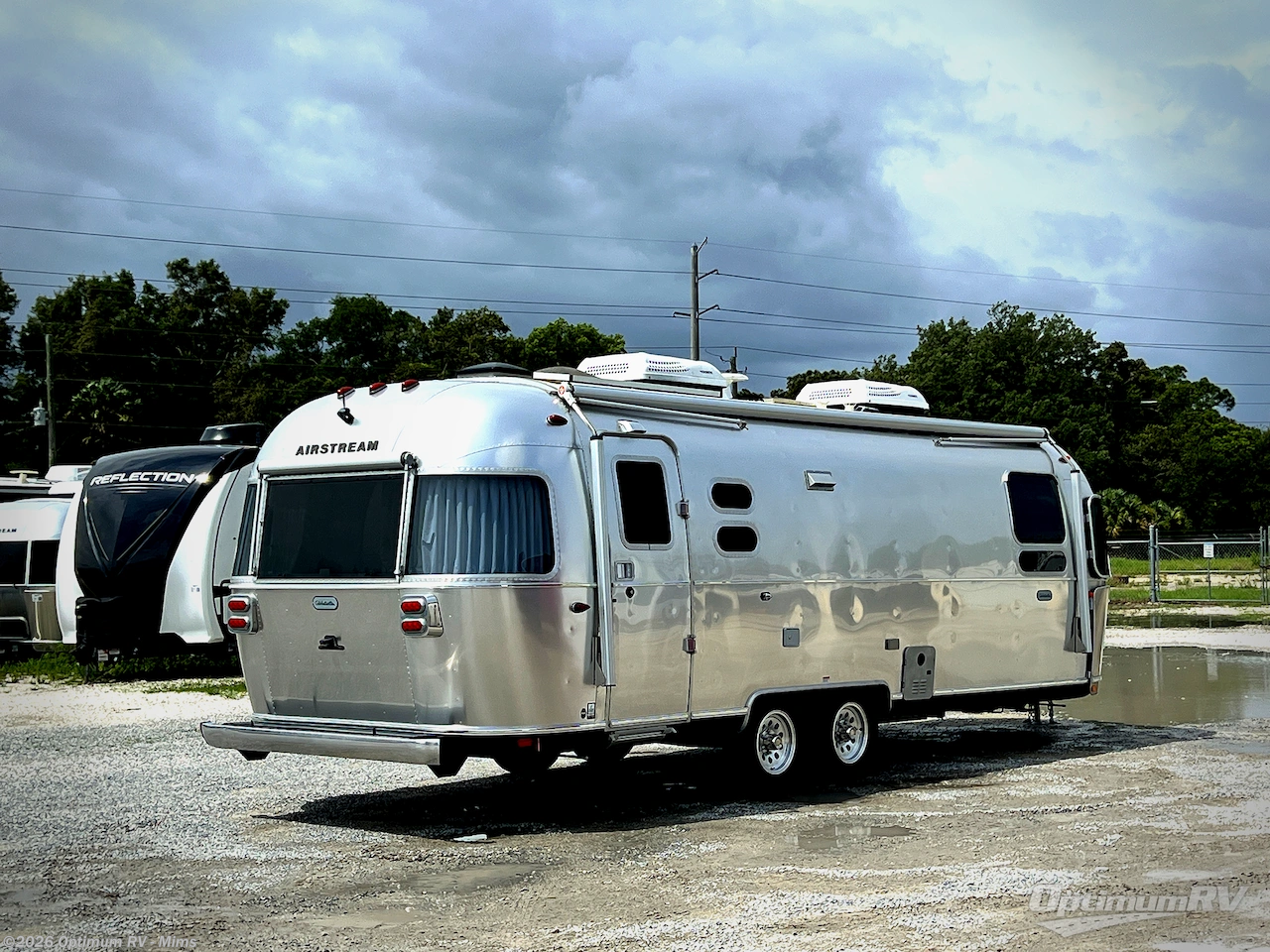 2021 Airstream Globetrotter 27FB - Used Travel Trailer For Sale by Optimum RV - Mims in Mims, Florida features Awning