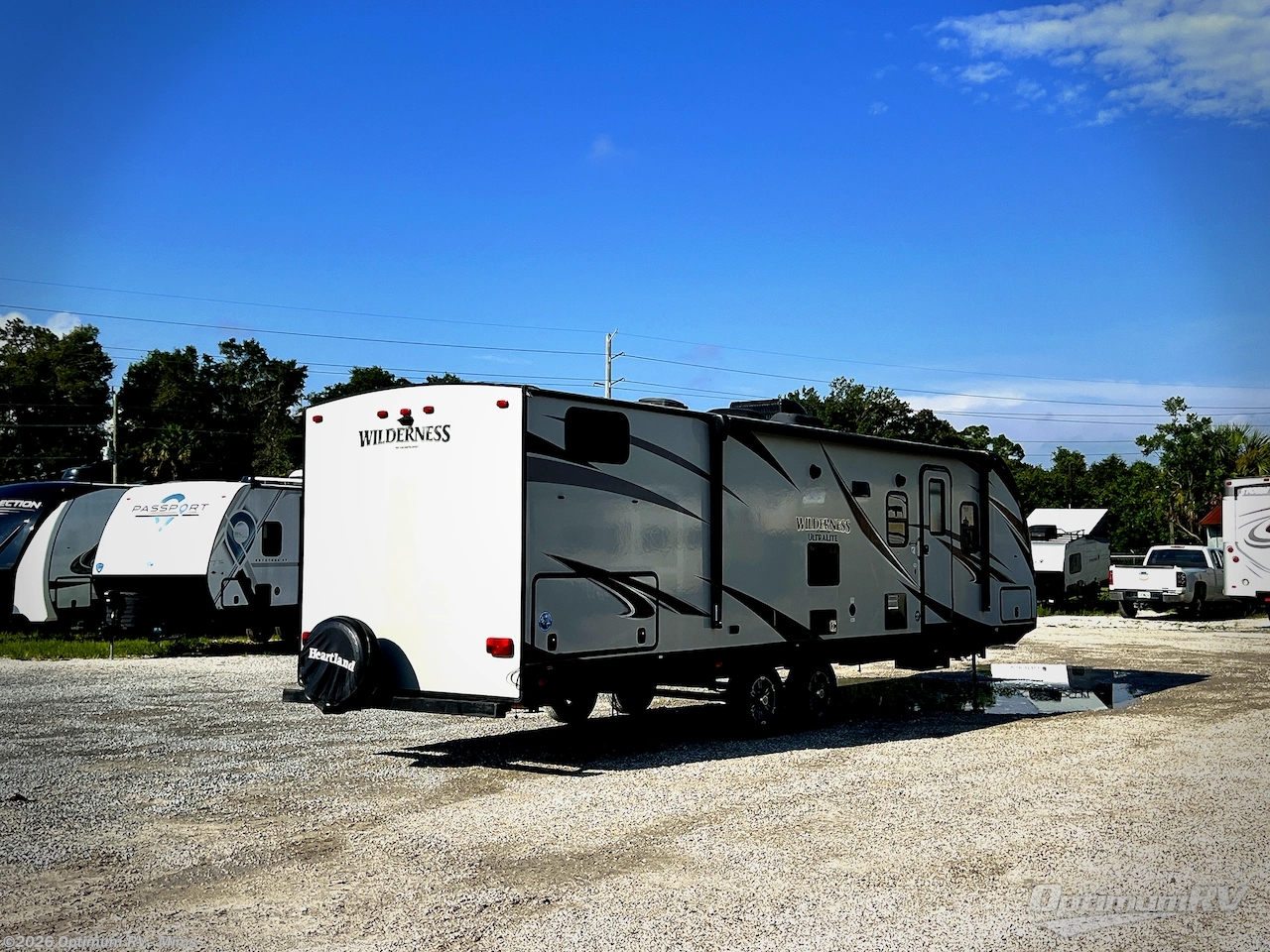2019 Heartland Wilderness 3185QB - Used Travel Trailer For Sale by Optimum RV - Mims in Mims, Florida features Awning, Slideout