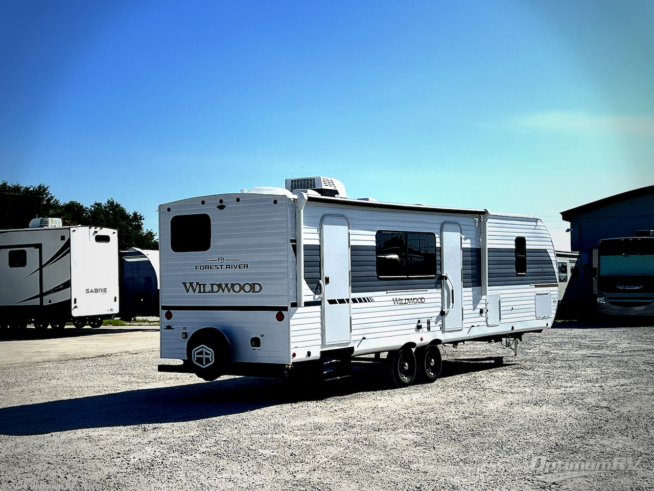 2027 Forest River Wildwood 26DBHD - New Travel Trailer For Sale by Optimum RV - Mims in Mims, Florida features Awning, Slideout