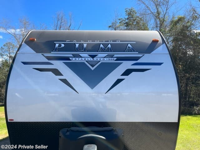 2021 Palomino Puma 28RKQS - Used Travel Trailer For Sale by For Sale By Owner in Canton, Georgia features Booth Dinette, Boot Drawer(s), CO Detector, Pass Thru Storage, Black Tank Flush