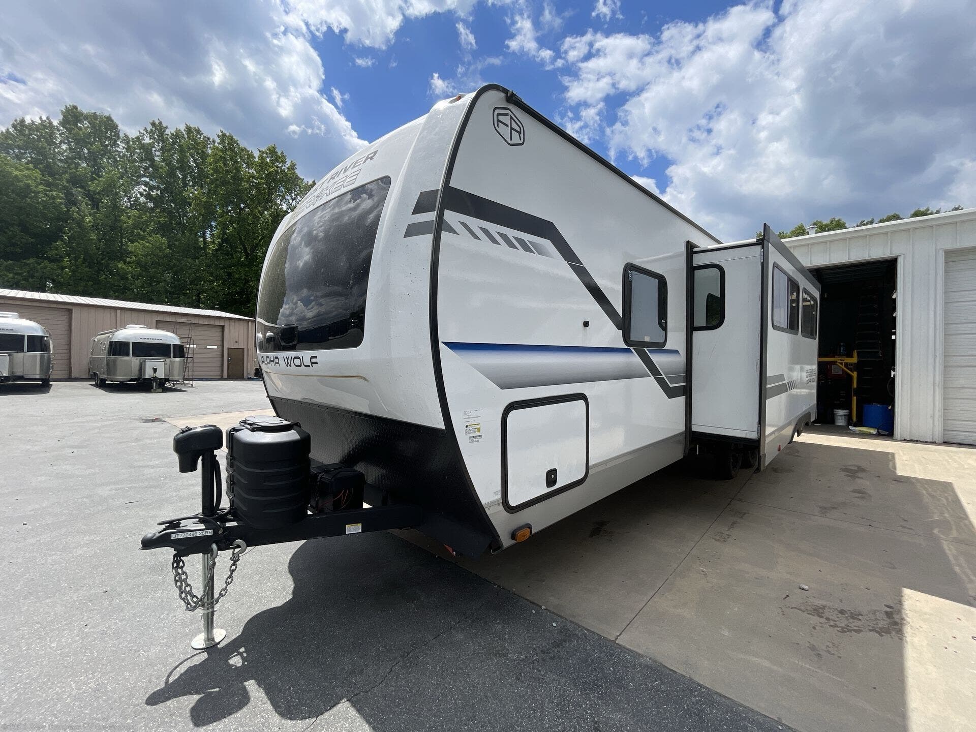 2025 Cherokee Alpha Wolf 25RB by Forest River from Blue Compass RV Greensboro in Colfax, North Carolina