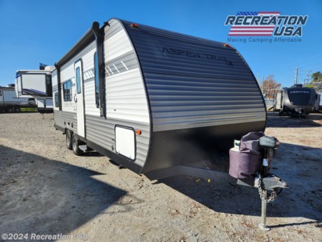 &lt;p&gt;30 amp, no slide, rear bathroom and bunks, queen bed on the front, travel trailer - 2022 Dutchmen Aspen Trail LE 25BH - *** Price Includes Prep *** - National Shipping Available NO HIDDEN FEES&lt;/p&gt;
&lt;h2 class=&quot;&quot; data-sourcepos=&quot;1:1-1:83&quot;&gt;&lt;span style=&quot;font-size: 14pt;&quot;&gt;2022 Dutchmen Aspen Trail LE 25BH: Unforgettable Family Camping Adventures Await&lt;/span&gt;&lt;/h2&gt;
&lt;p data-sourcepos=&quot;3:1-3:50&quot;&gt;Forget cramped tents and questionable hotel rooms! The &lt;strong&gt;2022 Dutchmen Aspen Trail LE 25BH&lt;/strong&gt; is your family&#39;s ticket to spacious comfort and unforgettable adventures on the open road. This lightweight, feature-packed travel trailer is more than just a vacation vehicle; it&#39;s your cozy home away from home, ready to whisk you away to breathtaking landscapes and lasting memories.&lt;/p&gt;
&lt;p data-sourcepos=&quot;7:1-7:24&quot;&gt;&lt;strong&gt;Sleeps Six in Style:&lt;/strong&gt;&lt;/p&gt;
&lt;p data-sourcepos=&quot;9:1-9:408&quot;&gt;Whether you&#39;re a seasoned camping clan or a first-time family adventure crew, the Aspen Trail LE 25BH comfortably accommodates up to six explorers. The &lt;strong&gt;spacious queen bed&lt;/strong&gt; provides a restful retreat for parents, while the &lt;strong&gt;double bunks&lt;/strong&gt; are a haven for adventurous little ones. A convertible dinette doubles as a play area or additional sleeping space, ensuring everyone has their own corner of comfort.&lt;/p&gt;
&lt;p data-sourcepos=&quot;13:1-13:33&quot;&gt;&lt;strong&gt;Entertainment for Every Mood:&lt;/strong&gt;&lt;/p&gt;
&lt;p data-sourcepos=&quot;15:1-15:297&quot;&gt;Rainy days are no match for the Aspen Trail LE 25BH&#39;s entertainment arsenal. Gather around the &lt;strong&gt;LED TV with built-in speakers&lt;/strong&gt; for movie nights, or crank up the &lt;strong&gt;AM/FM stereo&lt;/strong&gt; and let the singalongs begin. Board games and indoor activities also find their perfect home in this versatile space.&lt;/p&gt;
&lt;p data-sourcepos=&quot;17:1-17:34&quot;&gt;&lt;strong&gt;Your Culinary Oasis on Wheels:&lt;/strong&gt;&lt;/p&gt;
&lt;p data-sourcepos=&quot;19:1-19:280&quot;&gt;Forget campsite cooking woes! The well-equipped galley boasts a &lt;strong&gt;two-burner gas stove, microwave, and refrigerator&lt;/strong&gt;, making mealtimes a breeze. Whip up delicious pancakes for breakfast, enjoy hearty campfire-style dinners, and store your favorite snacks for spontaneous picnics.&lt;/p&gt;
&lt;p data-sourcepos=&quot;21:1-21:35&quot;&gt;&lt;strong&gt;Unwind and Recharge in Comfort:&lt;/strong&gt;&lt;/p&gt;
&lt;p data-sourcepos=&quot;23:1-23:296&quot;&gt;After a day of exploring hidden coves or conquering mountain trails, retreat to the &lt;strong&gt;private rear corner bathroom&lt;/strong&gt; with a shower and vanity. The &lt;strong&gt;spacious power awning&lt;/strong&gt; provides a shaded haven for outdoor relaxation, perfect for enjoying a cup of coffee in the morning or stargazing at night.&lt;/p&gt;
&lt;p data-sourcepos=&quot;27:1-27:13&quot;&gt;&lt;strong&gt;Lightweight and Ready to Roam:&lt;/strong&gt;&lt;/p&gt;
&lt;p data-sourcepos=&quot;29:1-29:443&quot;&gt;The Aspen Trail LE 25BH&#39;s &lt;strong&gt;lightweight design and easy-tow capabilities&lt;/strong&gt; make it ideal for any adventure, big or small. Whether you&#39;re heading to a nearby campground or embarking on a cross-country journey, this travel trailer is up for the challenge. &lt;strong&gt;Fuel efficiency&lt;/strong&gt; keeps gas station stops minimal, and convenient features like &lt;strong&gt;electric stabilizers and a quick-connect LP system&lt;/strong&gt; ensure effortless setup wherever you decide to camp.&lt;/p&gt;
&lt;p data-sourcepos=&quot;31:1-31:45&quot;&gt;&lt;strong&gt;Beyond the Features, It&#39;s About Memories:&lt;/strong&gt;&lt;/p&gt;
&lt;p data-sourcepos=&quot;33:1-33:382&quot;&gt;The 2022 Dutchmen Aspen Trail LE 25BH is an investment in experiences, not just a purchase. Imagine waking up to breathtaking sunrises, roasting marshmallows under a star-filled sky, and sharing stories around a crackling campfire. The Aspen Trail LE 25BH makes these dreams a reality, bringing families closer and creating lasting memories that will be cherished for years to come.&lt;/p&gt;
&lt;p data-sourcepos=&quot;37:1-37:26&quot;&gt;&lt;strong&gt;Ready to Hit the Road?&lt;/strong&gt;&lt;/p&gt;
&lt;p data-sourcepos=&quot;39:1-39:140&quot;&gt;Visit your local Dutchmen dealer today and experience the Aspen Trail LE 25BH difference. With its comfortable accommodations, entertainment options, and convenient features, this travel trailer is your gateway to endless possibilities. So, pack your bags, fill the tank, and let the Aspen Trail LE 25BH guide you to unforgettable adventures!&lt;/p&gt;
&lt;p data-sourcepos=&quot;39:1-39:140&quot;&gt;At Recreation USA our sale prices on our campers are fair and maybe the lowest in the country. There&#39;s zero price gouging, no additional fees for freight cost, no preparation fees, no fee for instructional walk-through, no pre-delivery inspection fee, no battery charging fee or for filling the propane tanks. Total transparency is our goal and we aim to deliver the best buying experience, so your family can start creating memories today.&lt;/p&gt;