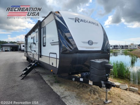 &lt;p&gt;30 AMP, 14.5K DUCTED AC, OUTDOOR KITCHEN, BUNKHOUSE 2 SLIDE TRAVEL TRAILER - 2020 Cruiser RV Radiance 30DS - *** Price Includes Prep *** - National Shipping Available&lt;/p&gt;
&lt;p&gt;Top Selling Features&lt;/p&gt;
&lt;ul&gt;
&lt;li&gt;Azdel Composite Laminated Walls&lt;/li&gt;
&lt;li&gt;- Patent Pending Fully Belly Storage&lt;/li&gt;
&lt;li&gt;- 6&#39; 11&quot; Barrel Roof- Painted, Fully Molded, Fiberglass Cap&lt;/li&gt;
&lt;li&gt;- 5-Sided Aluminum Construction&lt;/li&gt;
&lt;li&gt;- Patent Pending King Slide System&lt;/li&gt;
&lt;li&gt;- No Carpet throughout&lt;/li&gt;
&lt;li&gt;- Black-Out Roller Shades in Living Are&lt;/li&gt;
&lt;li&gt;- Plywood Flooring&lt;/li&gt;
&lt;li&gt;- Seamless Countertops&lt;/li&gt;
&lt;/ul&gt;
&lt;p&gt;Construction Features&lt;br&gt;Block foam insulation&lt;br&gt;6&amp;rsquo; 11&amp;rdquo; vaulted ceiling&lt;br&gt;E-Z lube hubs&lt;br&gt;30&amp;rdquo; main entry door&lt;br&gt;Electric slide-outs&lt;br&gt;5/8&amp;rdquo; tongue and groove plywood flooring&lt;/p&gt;
&lt;p&gt;Heat, Air, Power And Water Features&lt;br&gt;Dual ducted 14.5 BTU A/C&lt;br&gt;6 gal DSI gas/electric water heater&lt;br&gt;Black tank flush&lt;br&gt;2x 20lb LP tanks&lt;/p&gt;
&lt;p&gt;If your idea of roughing it involves king-size beds, cushy sofas and a fully decked out kitchen, Cruiser RV has the trailer for you. The Radiance blends the luxury your crazy heart desires with the affordability your practical side demands. Available in 13 diverse floorplans &amp;mdash; from two-person coaches to double-slide bunkhouse models &amp;mdash; this stunner outshines everything in its class.&lt;/p&gt;
&lt;p&gt;At Recreation USA our sale prices on our campers are fair and maybe the lowest in the country. There&#39;s zero price gouging, no additional fees for freight cost, no preparation fees, no fee for instructional walk-through, no pre-delivery inspection fee, no battery charging fee or for filling the propane tanks. Total transparency is our goal and we aim to deliver the best buying experience, so your family can start creating memories today.&amp;nbsp;&lt;/p&gt;