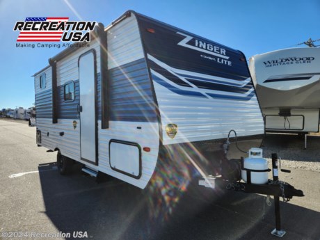 &lt;p&gt;The Zinger Lite has been carefully designed and engineered to welcome you to the Crossroads RV family! With a vast array of floor plans to choose from you&#39;ll be sure to find the right fit. The Zinger Lite also boasts an abundance of great features typically reserved for higher priced travel trailers. Some of these standard features include generous storage as well as diamond plate protection on the front of the trailer. Additionally, the Zinger Lite&#39;s innovative design offers a spacious 6&#39; 6&quot; tall ceiling and an 8&#39; interior width. Explore the Zinger Lite and welcome to Crossroads RV!&lt;/p&gt;
&lt;p&gt;Decor Zinger&lt;br&gt;2024 Smokey Tan&lt;br&gt;Microwave&lt;br&gt;Zinger Convenience Package&lt;br&gt;Refrigerator 12V 3 cf&lt;br&gt;13.5 BTU Air Conditioner&lt;/p&gt;
&lt;h2 data-sourcepos=&quot;1:1-1:91&quot;&gt;&lt;span style=&quot;font-size: 14pt;&quot;&gt;Get your camper for Less with the 2024 Crossroads Zinger 18QB Super Lite at Recreation USA!&lt;/span&gt;&lt;/h2&gt;
&lt;p data-sourcepos=&quot;3:1-3:99&quot;&gt;&lt;strong&gt;Adventure awaits at Recreation USA, where we make camping affordable for families of all sizes!&lt;/strong&gt;&lt;/p&gt;
&lt;p data-sourcepos=&quot;5:1-5:245&quot;&gt;The brand new 2024 Crossroads Zinger 18QB Super Lite is the perfect travel trailer for creating unforgettable memories without breaking the bank. This lightweight, single-axle wonder is ideal for exploring scenic landscapes or weekend getaways.&lt;/p&gt;
&lt;p data-sourcepos=&quot;7:1-7:63&quot;&gt;&lt;strong&gt;Here&#39;s what makes the Zinger 18QB Super Lite so incredible:&lt;/strong&gt;&lt;/p&gt;
&lt;ul data-sourcepos=&quot;9:1-13:0&quot;&gt;
&lt;li data-sourcepos=&quot;9:1-9:143&quot;&gt;&lt;strong&gt;Spacious comfort for up to 6:&lt;/strong&gt;&amp;nbsp;Sleep soundly in the generous quad bunk beds in the rear and a comfortable sleeping area in the main cabin.&lt;/li&gt;
&lt;li data-sourcepos=&quot;10:1-10:126&quot;&gt;&lt;strong&gt;Lightweight and easy to tow:&lt;/strong&gt;&amp;nbsp;The single-axle design makes this trailer a breeze to maneuver with most SUVs and trucks.&lt;/li&gt;
&lt;li data-sourcepos=&quot;11:1-11:218&quot;&gt;&lt;strong&gt;Hassle-free ownership:&lt;/strong&gt;&amp;nbsp;At Recreation USA, we believe in transparency. Our low advertised price includes&amp;nbsp;&lt;strong&gt;NO&lt;/strong&gt;&amp;nbsp;additional fees for freight, prep, PDI, battery charging, propane, or even a walk-through tutorial!&lt;/li&gt;
&lt;li data-sourcepos=&quot;12:1-13:0&quot;&gt;&lt;strong&gt;Financing options to fit your budget:&lt;/strong&gt;&amp;nbsp;We offer outstanding financing options to fit your needs, making your dream camping trip a reality.&lt;/li&gt;
&lt;/ul&gt;
&lt;p data-sourcepos=&quot;14:1-14:84&quot;&gt;&lt;strong&gt;At Recreation USA, we care about your family, including your furry companions!&lt;/strong&gt;&lt;/p&gt;
&lt;p data-sourcepos=&quot;16:1-16:153&quot;&gt;&lt;strong&gt;Don&#39;t wait! Visit Recreation USA today and experience the difference of affordable, stress-free RV ownership. Let&#39;s get you on the road to adventure!&lt;/strong&gt;&lt;/p&gt;
&lt;p data-sourcepos=&quot;18:1-18:39&quot;&gt;&lt;strong&gt;We look forward to seeing you soon!&lt;/strong&gt;&lt;/p&gt;