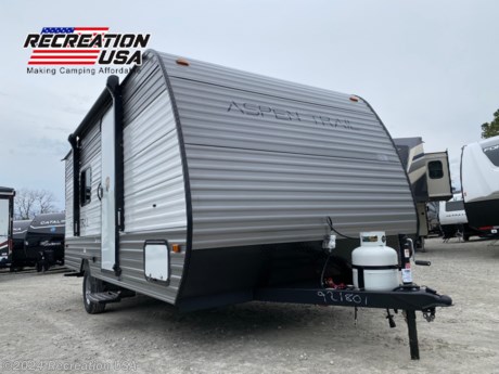 &lt;h2 data-sourcepos=&quot;1:1-1:84&quot;&gt;Unleash Adventure with the 2024 Dutchmen Aspen Trail Mini 17RB at Recreation USA!&lt;/h2&gt;
&lt;p data-sourcepos=&quot;3:1-3:294&quot;&gt;&lt;strong&gt;Experience the freedom of the open road&lt;/strong&gt; with the lightweight and budget-friendly 2024 Dutchmen Aspen Trail Mini 17RB, available now at Recreation USA! This &lt;strong&gt;single-axle&lt;/strong&gt; travel trailer is perfect for couples or small families seeking an &lt;strong&gt;affordable&lt;/strong&gt; and &lt;strong&gt;comfortable&lt;/strong&gt; camping getaway.&lt;/p&gt;
&lt;p data-sourcepos=&quot;5:1-5:30&quot;&gt;&lt;strong&gt;Why Choose Recreation USA?&lt;/strong&gt;&lt;/p&gt;
&lt;ul data-sourcepos=&quot;7:1-9:0&quot;&gt;
&lt;li data-sourcepos=&quot;7:1-7:435&quot;&gt;&lt;strong&gt;We make camping affordable:&lt;/strong&gt;&amp;nbsp;At Recreation USA, we believe everyone deserves to experience the joy of camping. That&#39;s why we offer&amp;nbsp;&lt;strong&gt;transparent pricing&lt;/strong&gt;&amp;nbsp;with&amp;nbsp;&lt;strong&gt;no hidden fees&lt;/strong&gt;. You won&#39;t find any price gouging, freight costs, preparation fees, instructional walk-through fees, pre-delivery inspection fees, battery charging fees, or propane filling fees here. Plus, we have&amp;nbsp;&lt;strong&gt;outstanding financing options&lt;/strong&gt;&amp;nbsp;to fit your budget.&lt;/li&gt;
&lt;li data-sourcepos=&quot;8:1-9:0&quot;&gt;&lt;strong&gt;We care about you and your family:&lt;/strong&gt;&amp;nbsp;We understand that your camping trip should be relaxing and enjoyable. Our friendly and knowledgeable staff is here to answer your questions and help you choose the perfect RV for your needs. We also welcome your&amp;nbsp;&lt;strong&gt;furry companions&lt;/strong&gt;, making Recreation USA the perfect destination for the whole family.&lt;/li&gt;
&lt;/ul&gt;
&lt;p data-sourcepos=&quot;10:1-10:44&quot;&gt;&lt;strong&gt;The 2024 Dutchmen Aspen Trail Mini 17RB:&lt;/strong&gt;&lt;/p&gt;
&lt;ul data-sourcepos=&quot;12:1-16:0&quot;&gt;
&lt;li data-sourcepos=&quot;12:1-12:142&quot;&gt;&lt;strong&gt;Lightweight and easy to tow:&lt;/strong&gt;&amp;nbsp;This single-axle trailer weighs only&amp;nbsp;&lt;strong&gt;3,069 lbs.&lt;/strong&gt;, making it ideal for SUVs with lower towing capacities.&lt;/li&gt;
&lt;li data-sourcepos=&quot;13:1-13:173&quot;&gt;&lt;strong&gt;Compact size, big on comfort:&lt;/strong&gt;&amp;nbsp;The 17RB offers a cozy and functional layout, featuring a&amp;nbsp;&lt;strong&gt;queen-size bed&lt;/strong&gt;&amp;nbsp;in the front and a&amp;nbsp;&lt;strong&gt;spacious rear bathroom&lt;/strong&gt;&amp;nbsp;with a shower.&lt;/li&gt;
&lt;li data-sourcepos=&quot;14:1-14:115&quot;&gt;&lt;strong&gt;Kitchen essentials:&lt;/strong&gt;&amp;nbsp;Prepare delicious meals with the 2-burner range top, 12-volt refrigerator, and microwave.&lt;/li&gt;
&lt;li data-sourcepos=&quot;15:1-16:0&quot;&gt;&lt;strong&gt;Relaxing outdoor space:&lt;/strong&gt;&amp;nbsp;Enjoy the beautiful scenery under the shade of the&amp;nbsp;&lt;strong&gt;10-foot awning&lt;/strong&gt;.&lt;/li&gt;
&lt;/ul&gt;
&lt;p data-sourcepos=&quot;17:1-17:224&quot;&gt;&lt;strong&gt;Don&#39;t wait any longer!&lt;/strong&gt; Visit Recreation USA today and let our team help you turn your camping dreams into reality. We have the perfect RV for you, along with the &lt;strong&gt;affordable prices and exceptional service&lt;/strong&gt; you deserve.&lt;/p&gt;
&lt;p data-sourcepos=&quot;19:1-19:55&quot;&gt;&lt;strong&gt;Together, let&#39;s make memories that last a lifetime!&lt;/strong&gt;&lt;/p&gt;