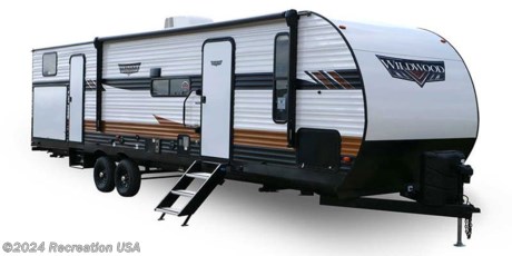 &lt;p&gt;&lt;strong&gt;INCOMING! IMAGES AND PICTURES COMING SOON! STAY TUNED! GIVE US A CALL 843-215-1800&lt;/strong&gt;&lt;/p&gt;
&lt;p&gt;The 33TS is the ultimate bunkhouse, with three total slide outs and an outside kitchen. This well-equipped travel trailer features oversized panoramic windows and the desirable Versa-Lounge. The back-bunk room features the Versa-Queen giving this floorplan the option for two queen beds!&lt;/p&gt;
&lt;p&gt;WILDWOOD TOWABLES&lt;br&gt;PLATINUM FIBERGLASS EXTERIOR WALLS&lt;br&gt;CAPRI DECOR&lt;br&gt;BEST IN CLASS VALUE PACKAGE&lt;br&gt;SPARE TIRE &amp;amp; CARRIER&lt;br&gt;15K BTU AC DUCTED W/QUICK COOL IPO 13.5&lt;br&gt;WASHER/DRYER PREP&lt;br&gt;OUTSIDE SHOWER&lt;br&gt;2ND 13.5K BTU AIR CONDITIONER W/50 AMP&amp;nbsp;SERVICE&lt;br&gt;PLATINUM MODEL DISCOUNT&lt;br&gt;BEST IN CLASS VALUE PACKAGE DISCOUNT&lt;/p&gt;
&lt;p&gt;&amp;nbsp;&lt;/p&gt;
&lt;p&gt;At Recreation USA our sale prices on our campers are fair and maybe the lowest in the country. There&#39;s zero price gouging, no additional fees for freight cost, no preparation fees, no fee for instructional walk-through, no pre-delivery inspection fee, no battery charging fee or for filling the propane tanks. Outstanding finacing options. Total transparency is our goal and we aim to deliver the best buying experience, so your family can start creating memories today. Visit us today or call 843-215-1800&lt;/p&gt;
&lt;p&gt;5031 Dick Pond Rd. Myrtle Beach SC 29588&lt;br&gt;&lt;a title=&quot;Directions&quot; href=&quot;https://maps.app.goo.gl/wbpUdhpFfBgkQKSW9&quot; target=&quot;_blank&quot; rel=&quot;noopener&quot;&gt;https://maps.app.goo.gl/wbpUdhpFfBgkQKSW9&lt;/a&gt;&lt;/p&gt;