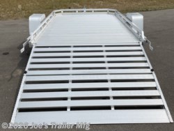 Aluma Executive Series trailer, 77"x10' utility trailer, 3.5K EZ-Lube torsion axle, ST205/75R14 Load Range C tires, black aluminum rims, aluminum fenders with steps, trailer tongue handle, aluminum trailer floor, front retaining rails, side retaining rails, A-frame aluminum tongue, 2" coupler, stake pockets, D-rings, 1.2K swivel jack, LED lighting with deck lighting, heavy-duty utility trailer, aluminum utility trailer, high-quality trailer components, durable trailer design, versatile utility trailer, off-road utility trailer, robust trailer construction, lightweight aluminum trailer, easy maintenance utility trailer, premium trailer features, rugged trailer design, customizable utility trailer, heavy-load trailer capabilities, secure trailer fittings, high-performance trailer accessories. Aluma Executive Series trailer, 77"x10' utility trailer, 3.5K EZ-Lube torsion axle, ST205/75R14 Load Range C tires, black aluminum rims, aluminum fenders with steps, trailer tongue handle, aluminum trailer floor, front retaining rails, side retaining rails, A-frame aluminum tongue, 2" coupler, stake pockets, D-rings, 1.2K swivel jack, LED lighting with deck lighting, heavy-duty utility trailer, aluminum utility trailer, high-quality trailer components, durable trailer design, versatile utility trailer, off-road utility trailer, robust trailer construction, lightweight aluminum trailer, easy maintenance utility trailer, premium trailer features, rugged trailer design, customizable utility trailer, heavy-load trailer capabilities, secure trailer fittings, high-performance trailer accessories.