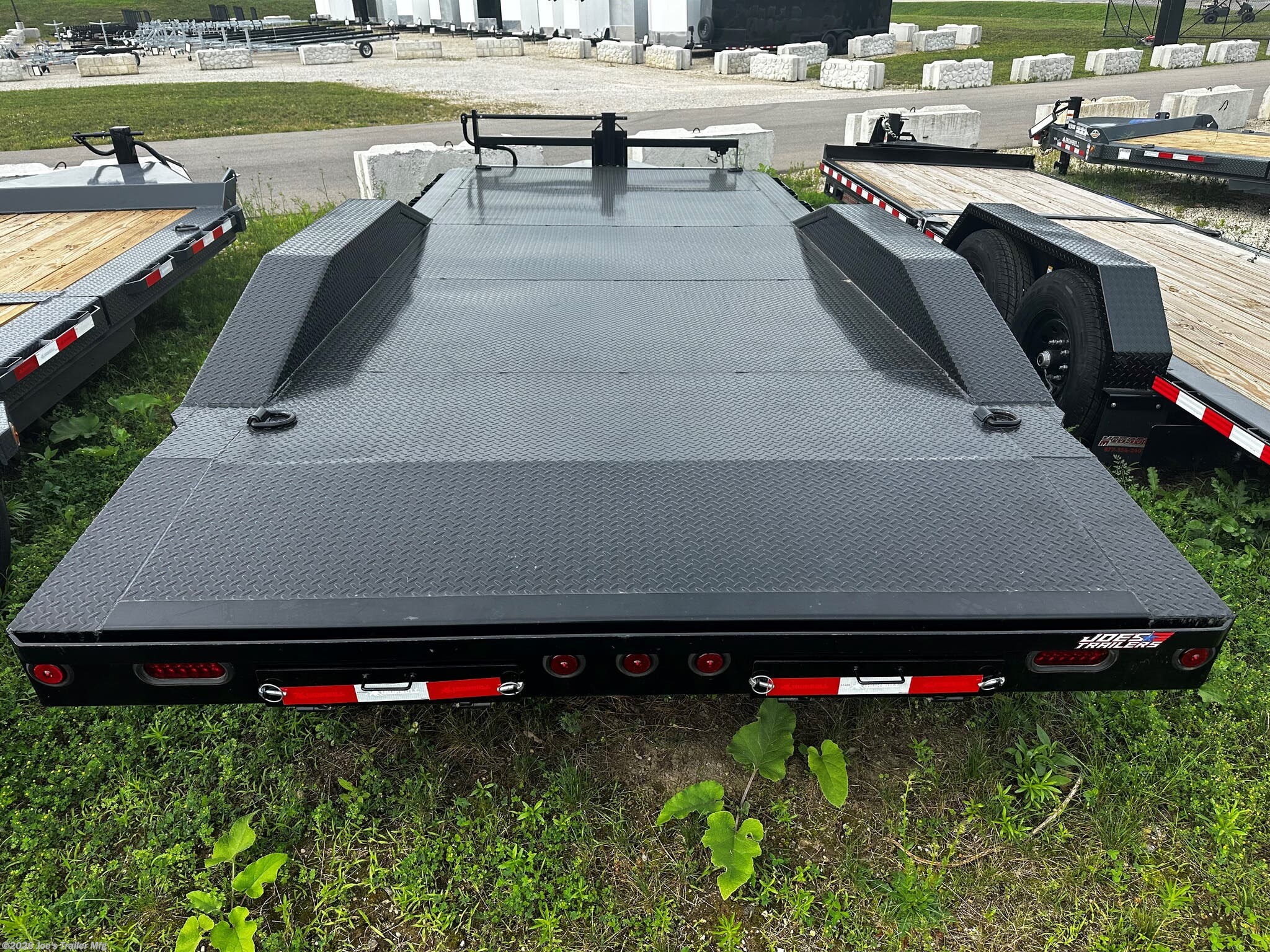 IronBull 102" x 20' Utility Trailer, IronBull ETB0220, Driveover Fenders, 14000 lbs GVWR, Powdura Powder Coat, One Cure Primer, 7000 lb axles, 3042 lb dry weight, 10000 lb drop-leg jack, EZ Lube Oil-Bathed Hubs, Radial Tires, 235/80 R16 tires, 20-foot utility trailer, 25-inch deck height, Slide-In Ramps, 18'' x 5' ramps, D-Rings, 3'' D-Rings, Adjustable Coupler, 2 5/16'' coupler, 3-inch Structural Crossmembers, Electric Breakaway Kit, DOT-Approved Lighting, steel frame, steel floor, Driveover fenders, Lifetime LED Lighting warranty, 3-year structural coverage, 2-year component coverage, Free Roadside Assistance, heavy-duty utility trailer, versatile hauling solution, commercial use trailer, personal use trailer, high-performance trailer, durable trailer, reliable trailer, trailer for heavy equipment, trailer for vehicles, trailer dealer, trailer manufacturer, trailer financing, trailer specials, utility trailer for sale, new utility trailer, high-quality utility trailer, trailer review
