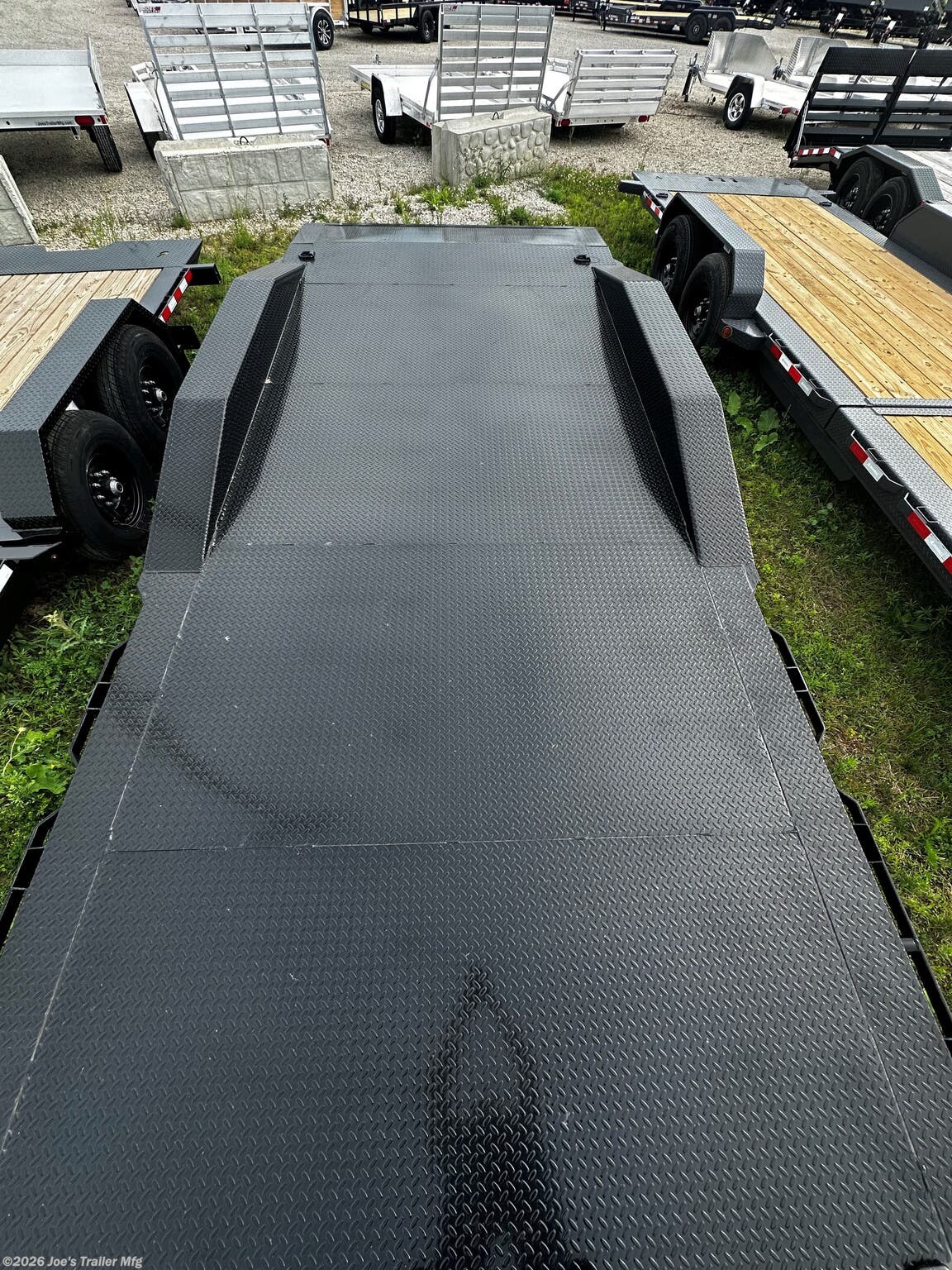 IronBull 102" x 20' Utility Trailer, IronBull ETB0220, Driveover Fenders, 14000 lbs GVWR, Powdura Powder Coat, One Cure Primer, 7000 lb axles, 3042 lb dry weight, 10000 lb drop-leg jack, EZ Lube Oil-Bathed Hubs, Radial Tires, 235/80 R16 tires, 20-foot utility trailer, 25-inch deck height, Slide-In Ramps, 18'' x 5' ramps, D-Rings, 3'' D-Rings, Adjustable Coupler, 2 5/16'' coupler, 3-inch Structural Crossmembers, Electric Breakaway Kit, DOT-Approved Lighting, steel frame, steel floor, Driveover fenders, Lifetime LED Lighting warranty, 3-year structural coverage, 2-year component coverage, Free Roadside Assistance, heavy-duty utility trailer, versatile hauling solution, commercial use trailer, personal use trailer, high-performance trailer, durable trailer, reliable trailer, trailer for heavy equipment, trailer for vehicles, trailer dealer, trailer manufacturer, trailer financing, trailer specials, utility trailer for sale, new utility trailer, high-quality utility trailer, trailer review