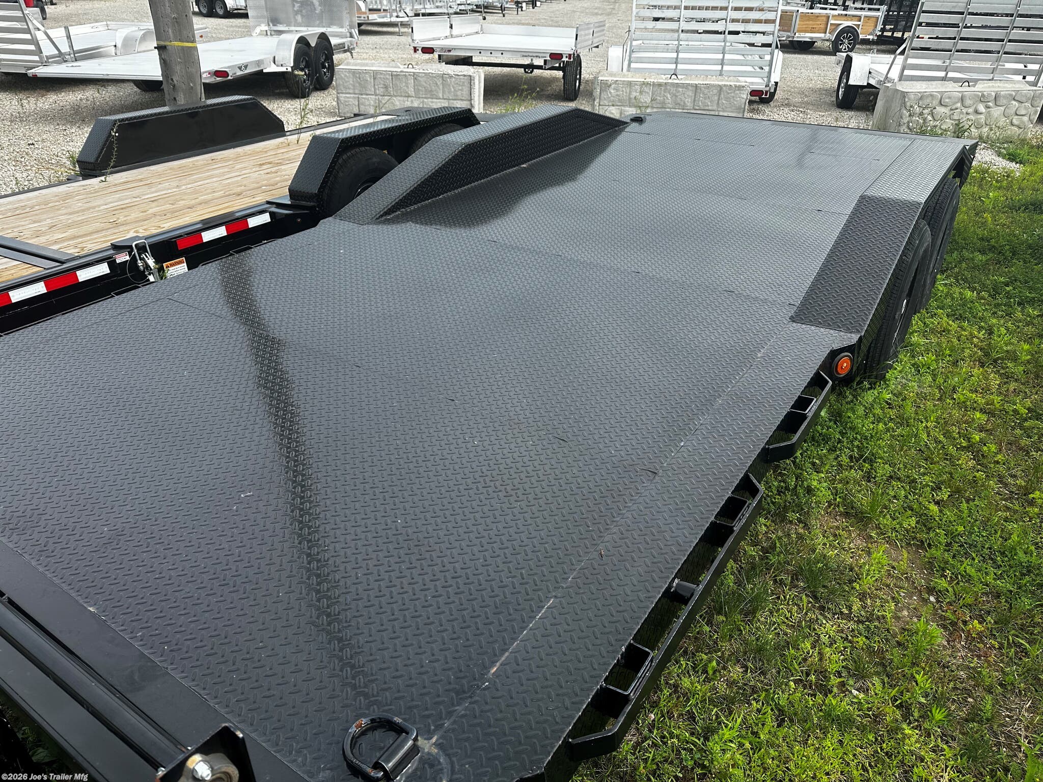 IronBull 102" x 20' Utility Trailer, IronBull ETB0220, Driveover Fenders, 14000 lbs GVWR, Powdura Powder Coat, One Cure Primer, 7000 lb axles, 3042 lb dry weight, 10000 lb drop-leg jack, EZ Lube Oil-Bathed Hubs, Radial Tires, 235/80 R16 tires, 20-foot utility trailer, 25-inch deck height, Slide-In Ramps, 18'' x 5' ramps, D-Rings, 3'' D-Rings, Adjustable Coupler, 2 5/16'' coupler, 3-inch Structural Crossmembers, Electric Breakaway Kit, DOT-Approved Lighting, steel frame, steel floor, Driveover fenders, Lifetime LED Lighting warranty, 3-year structural coverage, 2-year component coverage, Free Roadside Assistance, heavy-duty utility trailer, versatile hauling solution, commercial use trailer, personal use trailer, high-performance trailer, durable trailer, reliable trailer, trailer for heavy equipment, trailer for vehicles, trailer dealer, trailer manufacturer, trailer financing, trailer specials, utility trailer for sale, new utility trailer, high-quality utility trailer, trailer review