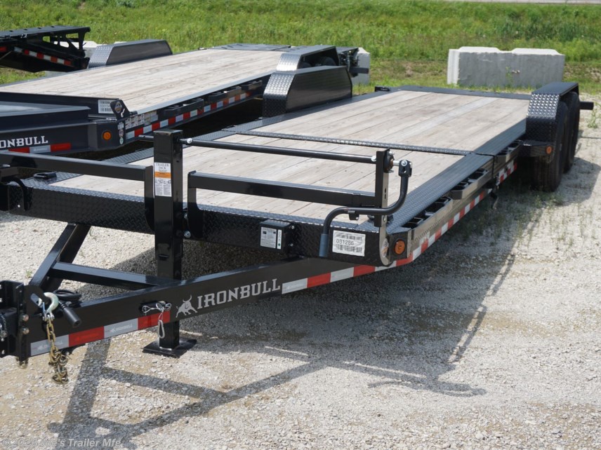Ironbull TLB8324 Tilt Bed Equipment Trailer, heavy-duty trailer, equipment trailer, durable trailer, easy-to-use trailer, robust construction, reliable performance, transporting equipment, 6" channel tongue, 20" deck height, 11-degree loading angle, knife edge tail, Sherwin-Williams Powdura powder coat, formed 3 x 3/16" channel cross members, removable diamond plate fenders, rub rail, stake pockets, 4 standard 3" D-rings, 5200 lb torsion axles, 7000 lb torsion axles, cambered torsion axles, multi-leaf slipper spring suspension, 2 5/16" adjustable coupler, 10k drop-leg jack, radial tires, E-Z Lube hubs, 3" x 10" cylinder, 1.5" shaft, treated pine floor, lifetime LED lighting, DOT approved lighting, molded sealed harness with resistors, 7-way receiver female plug, adapter, trailer features, trailer specifications, trailer durability, trailer ease of use, trailer performance, trailer construction, trailer lighting, trailer flooring, trailer axles, trailer suspension, trailer coupler, tra Ironbull TLB8324 Tilt Bed Equipment Trailer, heavy-duty trailer, equipment trailer, durable trailer, easy-to-use trailer, robust construction, reliable performance, transporting equipment, 6" channel tongue, 20" deck height, 11-degree loading angle, knife edge tail, Sherwin-Williams Powdura powder coat, formed 3 x 3/16" channel cross members, removable diamond plate fenders, rub rail, stake pockets, 4 standard 3" D-rings, 5200 lb torsion axles, 7000 lb torsion axles, cambered torsion axles, multi-leaf slipper spring suspension, 2 5/16" adjustable coupler, 10k drop-leg jack, radial tires, E-Z Lube hubs, 3" x 10" cylinder, 1.5" shaft, treated pine floor, lifetime LED lighting, DOT approved lighting, molded sealed harness with resistors, 7-way receiver female plug, adapter, trailer features, trailer specifications, trailer durability, trailer ease of use, trailer performance, trailer construction, trailer lighting, trailer flooring, trailer axles, trailer suspension, trailer coupler, tra