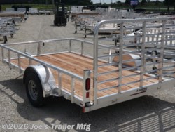 Legend 7x12 Open Deluxe Utility Trailer, 17" deck height utility trailer, 48" ramp gate trailer, 3.5k EZ-Lube spring axle, ST205/75R14 Silver Mod steel tires, 3" tube cross members, 24" on center cross member spacing, 4" tube frame trailer, aluminum flooring utility trailer, LED lighting trailer, 2" straight coupler, 2k top-wind jack, ATP fenders, stake pockets, aluminum utility trailer, open deluxe trailer, Legend utility trailer, lightweight utility trailer, durable trailer frame, trailer with LED lights, easy-to-lube axle, high-quality utility trailer, trailer with ramp gate, spring axle utility trailer, Legend trailer features, utility trailer with aluminum flooring, adjustable coupler trailer, top-wind jack utility trailer, trailer with ATP fenders, customizable utility trailer, Legend open trailer, utility trailer for heavy loads, trailer for equipment transport, low-profile utility trailer, trailer with stake pockets, utility trailer for landscaping, 12' utility trailer, trailer Legend 7x12 Open Deluxe Utility Trailer, 17" deck height utility trailer, 48" ramp gate trailer, 3.5k EZ-Lube spring axle, ST205/75R14 Silver Mod steel tires, 3" tube cross members, 24" on center cross member spacing, 4" tube frame trailer, aluminum flooring utility trailer, LED lighting trailer, 2" straight coupler, 2k top-wind jack, ATP fenders, stake pockets, aluminum utility trailer, open deluxe trailer, Legend utility trailer, lightweight utility trailer, durable trailer frame, trailer with LED lights, easy-to-lube axle, high-quality utility trailer, trailer with ramp gate, spring axle utility trailer, Legend trailer features, utility trailer with aluminum flooring, adjustable coupler trailer, top-wind jack utility trailer, trailer with ATP fenders, customizable utility trailer, Legend open trailer, utility trailer for heavy loads, trailer for equipment transport, low-profile utility trailer, trailer with stake pockets, utility trailer for landscaping, 12' utility trailer, trailer