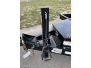 Hydraulic tongue jack dump trailer
