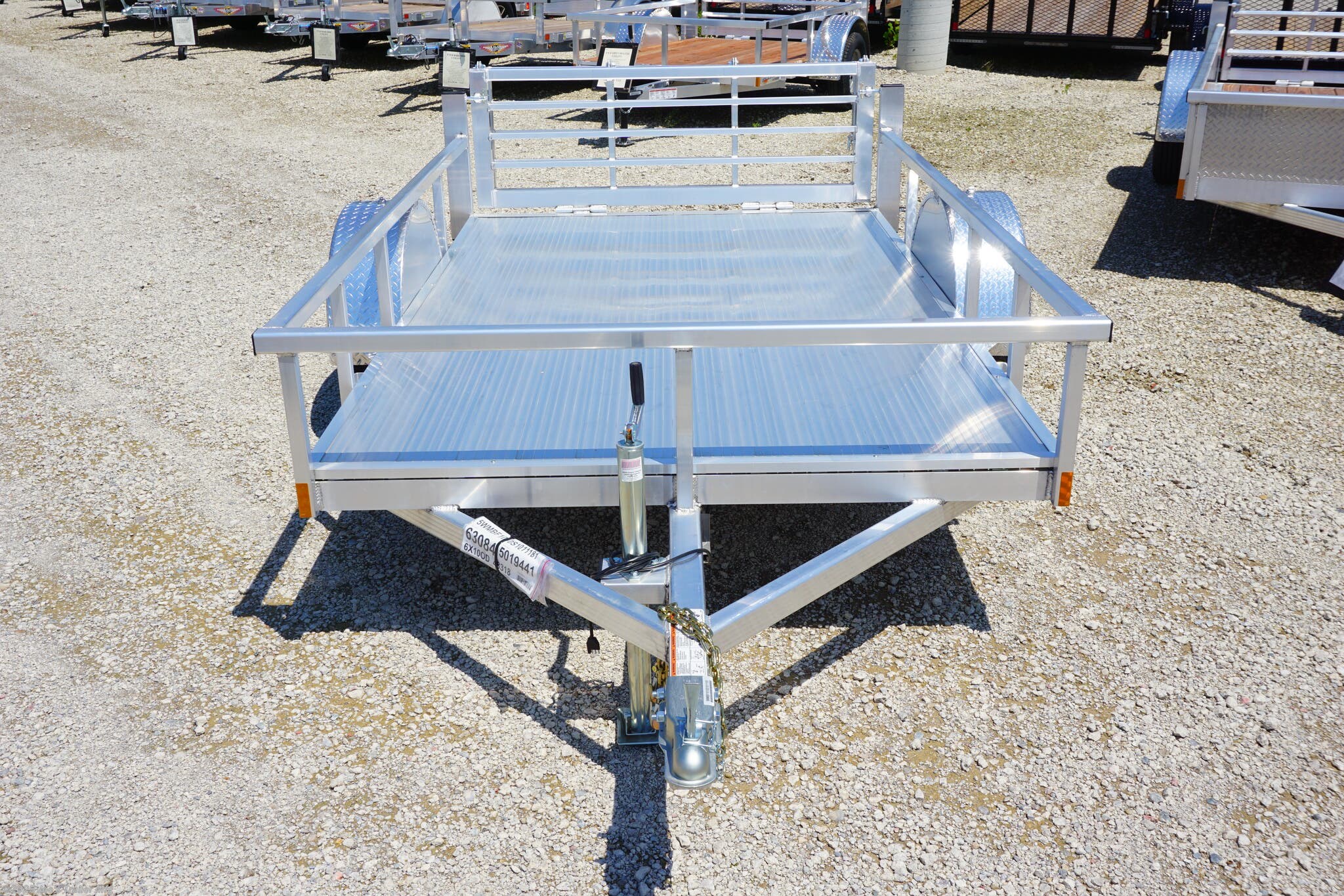 6x10 ODSA, 16" Deck Height, Bi Fold Gate, 3k EZ-Lube Axle, ST20575R14 Silver Mod Steel Tires, 3" Cross Member, 24" On Center Cross Member, 3" Angle Frame, Aluminum Decking, Led Lighting, 2" A-Frame Coupler, 2k Top-Wind Jack, ATP Fenders, Load Angle, Ramp Length, Load Angle 18°, Ramp Length 48", Ramp Pivot Point, Trailer Specifications, Utility Trailer, Flatbed Trailer, Utility Trailer with Bi Fold Gate, Trailer with EZ-Lube Axle, Trailer with Silver Mod Steel Tires, Trailer with Cross Members, Trailer with Angle Frame, Trailer with Aluminum Decking, Trailer with LED Lighting, Trailer with A-Frame Coupler, Trailer with Top-Wind Jack, Trailer with ATP Fenders, Low Deck Height Trailer, Easy Loading Trailer, Trailer with Durable Frame, Trailer with Heavy Duty Axle, Trailer with Silver Tires, Trailer with Adjustable Ramp, High Quality Utility Trailer, Utility Trailer Features, Heavy Duty Utility Trailer, Utility Trailer Dimensions, Utility Trailer Load Angle, Utility Trailer Ramp Length, Ut