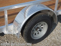 Legend 7X12' Open Deluxe Utility Trailer, 7X12 Utility Trailer, Legend Utility Trailer, Open Deluxe Utility Trailer, 17" Deck Height Trailer, 48" Ramp Gate Trailer, 3.5k EZ-Lube Spring Axle, EZ-Lube Spring Axle Trailer, ST205/75R14 Silver Mod Steel Tires, Silver Mod Steel Tires Trailer, 3" Tube Cross Members, 24" On Center Cross Member Spacing, 4" Tube Frame Trailer, treated wood decking trailer, LED Lighting Trailer, 2" Straight Coupler Trailer, 2k Top-Wind Jack, ATP Fenders Trailer, Stake Pockets Trailer, 7x12 Utility Trailer for Sale, Utility Trailer with Ramp Gate, Heavy-Duty Utility Trailer, Best Utility Trailer, Affordable Utility Trailer, Utility Trailer without Brakes, Durable Utility Trailer, Custom Utility Trailer, Utility Trailer with Treated Wood Decking, Utility Trailer with LED Lights, Utility Trailer with 2" Coupler, Utility Trailer with EZ-Lube Axle, Utility Trailer with Top-Wind Jack, Utility Trailer with ATP Fenders, Stake Pockets Utility Trailer, Trailer for Landscap Legend 7X12' Open Deluxe Utility Trailer, 7X12 Utility Trailer, Legend Utility Trailer, Open Deluxe Utility Trailer, 17" Deck Height Trailer, 48" Ramp Gate Trailer, 3.5k EZ-Lube Spring Axle, EZ-Lube Spring Axle Trailer, ST205/75R14 Silver Mod Steel Tires, Silver Mod Steel Tires Trailer, 3" Tube Cross Members, 24" On Center Cross Member Spacing, 4" Tube Frame Trailer, treated wood decking trailer, LED Lighting Trailer, 2" Straight Coupler Trailer, 2k Top-Wind Jack, ATP Fenders Trailer, Stake Pockets Trailer, 7x12 Utility Trailer for Sale, Utility Trailer with Ramp Gate, Heavy-Duty Utility Trailer, Best Utility Trailer, Affordable Utility Trailer, Utility Trailer without Brakes, Durable Utility Trailer, Custom Utility Trailer, Utility Trailer with Treated Wood Decking, Utility Trailer with LED Lights, Utility Trailer with 2" Coupler, Utility Trailer with EZ-Lube Axle, Utility Trailer with Top-Wind Jack, Utility Trailer with ATP Fenders, Stake Pockets Utility Trailer, Trailer for Landscap