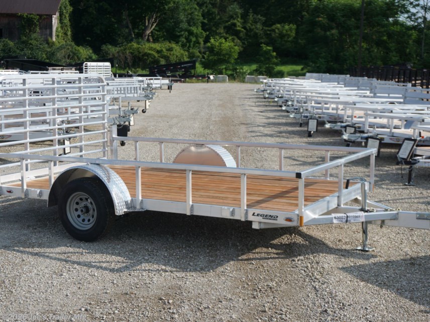 Legend 7X12' Open Deluxe Utility Trailer, 7X12 Utility Trailer, Legend Utility Trailer, Open Deluxe Utility Trailer, 17" Deck Height Trailer, 48" Ramp Gate Trailer, 3.5k EZ-Lube Spring Axle, EZ-Lube Spring Axle Trailer, ST205/75R14 Silver Mod Steel Tires, Silver Mod Steel Tires Trailer, 3" Tube Cross Members, 24" On Center Cross Member Spacing, 4" Tube Frame Trailer, treated wood decking trailer, LED Lighting Trailer, 2" Straight Coupler Trailer, 2k Top-Wind Jack, ATP Fenders Trailer, Stake Pockets Trailer, 7x12 Utility Trailer for Sale, Utility Trailer with Ramp Gate, Heavy-Duty Utility Trailer, Best Utility Trailer, Affordable Utility Trailer, Utility Trailer without Brakes, Durable Utility Trailer, Custom Utility Trailer, Utility Trailer with Treated Wood Decking, Utility Trailer with LED Lights, Utility Trailer with 2" Coupler, Utility Trailer with EZ-Lube Axle, Utility Trailer with Top-Wind Jack, Utility Trailer with ATP Fenders, Stake Pockets Utility Trailer, Trailer for Landscap Legend 7X12' Open Deluxe Utility Trailer, 7X12 Utility Trailer, Legend Utility Trailer, Open Deluxe Utility Trailer, 17" Deck Height Trailer, 48" Ramp Gate Trailer, 3.5k EZ-Lube Spring Axle, EZ-Lube Spring Axle Trailer, ST205/75R14 Silver Mod Steel Tires, Silver Mod Steel Tires Trailer, 3" Tube Cross Members, 24" On Center Cross Member Spacing, 4" Tube Frame Trailer, treated wood decking trailer, LED Lighting Trailer, 2" Straight Coupler Trailer, 2k Top-Wind Jack, ATP Fenders Trailer, Stake Pockets Trailer, 7x12 Utility Trailer for Sale, Utility Trailer with Ramp Gate, Heavy-Duty Utility Trailer, Best Utility Trailer, Affordable Utility Trailer, Utility Trailer without Brakes, Durable Utility Trailer, Custom Utility Trailer, Utility Trailer with Treated Wood Decking, Utility Trailer with LED Lights, Utility Trailer with 2" Coupler, Utility Trailer with EZ-Lube Axle, Utility Trailer with Top-Wind Jack, Utility Trailer with ATP Fenders, Stake Pockets Utility Trailer, Trailer for Landscap