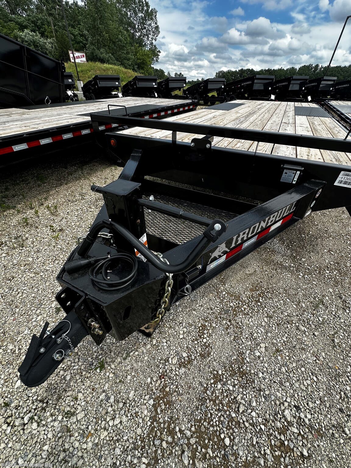 Legend - Tandem Axle: FDP 102 x 22, 10” I-Beam Frame and Tongue, 2 5/16” Adjustable Coupler, 16” Structural Crossmembers, Deck Height 33”, Rub Rail, Stake Pockets & Pipe Spools, Cambered Spring Axles, Multi-leaf Slipper Spring Suspension, E-Z Lube Hubs, 2 Electric Brake Axles, Full 102’ Wide Deckover, Slide in Ramps, 10k Drop-Leg Jack, Treated Pine 2x8 Floor, 4 Standard 3” D-Rings, 235/80R16 Radial Tires with 8 Hole Wheel, Lifetime LED Lighting, All Lighting DOT Approved, Molded Sealed Harness with Resistors, 7-Way Receiver Female Plug with Adapter
