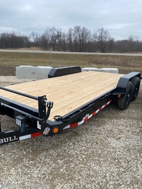 Ironbull ETB8324 Equipment Trailer, 8'' Channel Tongue, 8'' Channel Frame, 2 5/16" Adjustable Coupler, 3" Channel Crossmembers, 2.5 x 2.5 Front Bumper Rail, Rub Rail, Stake Pockets, Removable Diamond Plate Fenders, Cambered Brake Axles, Brakes Equipped, Multi-leaf Slipper Spring Suspension, E-Z Lube Hubs, 2 Electric Brake Axles, 18" x 5' Slide-in Ramps, 10k Drop-Leg Jack, 7k Drop-Leg Jack, 5,500 lb Axles, Treated Pine Floor, 2" x 8" Floor, 4 Standard 3" D-Rings, Radial Tires, Lifetime LED Lighting, DOT Approved Lighting, Molded Sealed Harness, Resistor Wiring Harness, 7-Way Receiver Female Plug, 7-Way Plug Adapter, Powdura Powder Coat, Load Angle 26°, Ramp Length 61 Inches, Heavy-Duty Equipment Trailer, Adjustable Coupler Trailer, Trailer with Diamond Plate Fenders, Multi-leaf Suspension Trailer, E-Z Lube Hubs Trailer, Slide-in Ramps, Drop-Leg Jack, Durable Trailer Floor, Standard D-Rings, LED Trailer Lights, Powder Coated Trailer, Equipment Hauler, Utility Trailer with Brakes, Trailer