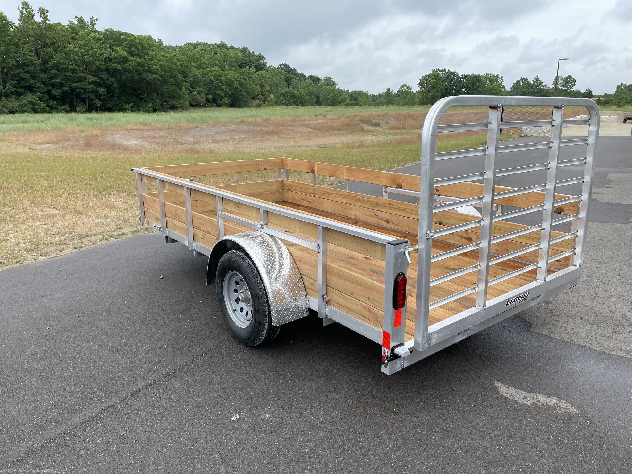 Legend High Side Legend Aluminum 3-Board Utility Trailer, 16" Deck Height, 48" Ramp Gate, 3k EZ-Lube Axle, ST20575R14 Silver Mod Steel Tires, 3" Cross Member, 24" On Center Cross Member, 3" Angle Frame, Treated Wood Decking, LED Lighting, 2" A-Frame Coupler, 2k Top-Wind Jack, ATP Fenders, Brakes: None, Load Angle & Ramp Length, Load Angle: 16°, Ramp Length: 48" (Measured from ramp pivot point), Utility Trailer, Aluminum Utility Trailer, EZ-Lube Axle Trailer, Steel Tires Trailer, Cross Member Trailer, Angle Frame Trailer, Treated Wood Deck Trailer, LED Lighting Trailer, A-Frame Coupler Trailer, Top-Wind Jack Trailer, ATP Fenders Trailer, No Brakes Trailer, Load Angle Trailer, Ramp Length Trailer, 3-Board Utility Trailer, 48" Ramp Utility Trailer, 16" Deck Height Trailer