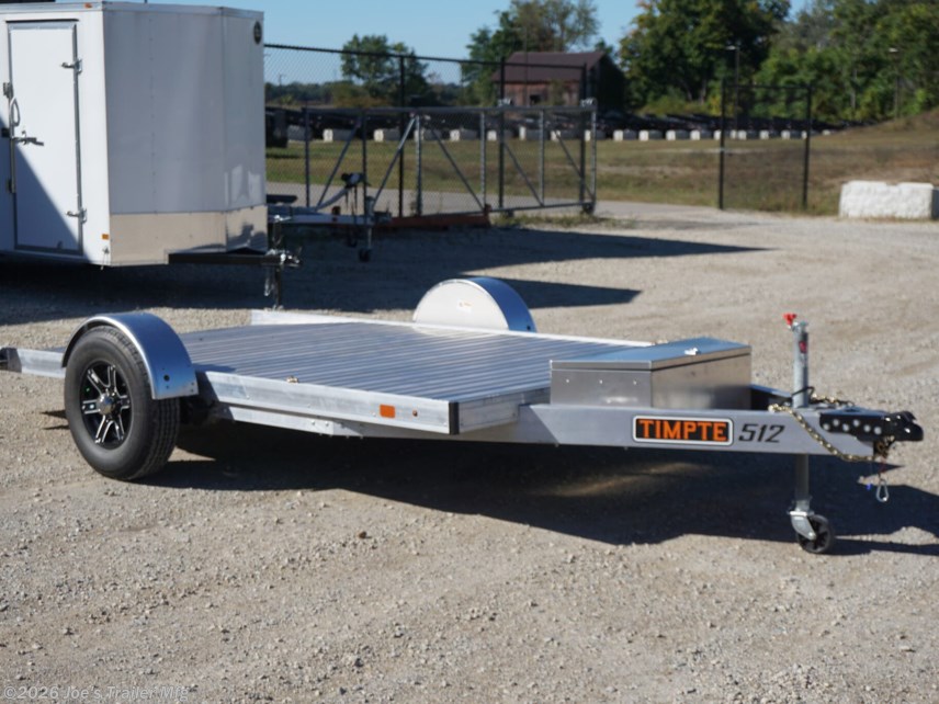 2024 Timpte 0512TSEZ Utility Trailer, Timpte trailers, utility trailer specifications, 5,000 lbs GVWR trailer, heavy-duty trailer, EZ Loader Drop Deck System, wireless remote trailer, vehicle hauling trailer, equipment transport trailer, material transport trailer, durable utility trailer, trailer with torsion axle, trailer with electric self-adjusting brakes, radial tire trailer, ST225/75R15 radial tires, full LED lighting trailer, Wilmington NC trailer, new utility trailer for sale, 144-inch trailer length, 75-inch trailer width, 2,000 lbs top wind jack, 2 5/16" coupler trailer, bumper pull hitch type, trailer with 4 D rings, high-quality material trailer, weather-resistant trailer, trailer with precision engineering, Wilmington trailer dealer, 2024 trailer models, GVWR trailer, one axle trailer, utility trailer with wireless remote, reliable hauling trailer, best trailer for heavy loads, Timpte 2024 trailer lineup, self-adjusting brakes trailer, trailer with full LED package, Wilmin 2024 Timpte 0512TSEZ Utility Trailer, Timpte trailers, utility trailer specifications, 5,000 lbs GVWR trailer, heavy-duty trailer, EZ Loader Drop Deck System, wireless remote trailer, vehicle hauling trailer, equipment transport trailer, material transport trailer, durable utility trailer, trailer with torsion axle, trailer with electric self-adjusting brakes, radial tire trailer, ST225/75R15 radial tires, full LED lighting trailer, Wilmington NC trailer, new utility trailer for sale, 144-inch trailer length, 75-inch trailer width, 2,000 lbs top wind jack, 2 5/16" coupler trailer, bumper pull hitch type, trailer with 4 D rings, high-quality material trailer, weather-resistant trailer, trailer with precision engineering, Wilmington trailer dealer, 2024 trailer models, GVWR trailer, one axle trailer, utility trailer with wireless remote, reliable hauling trailer, best trailer for heavy loads, Timpte 2024 trailer lineup, self-adjusting brakes trailer, trailer with full LED package, Wilmin