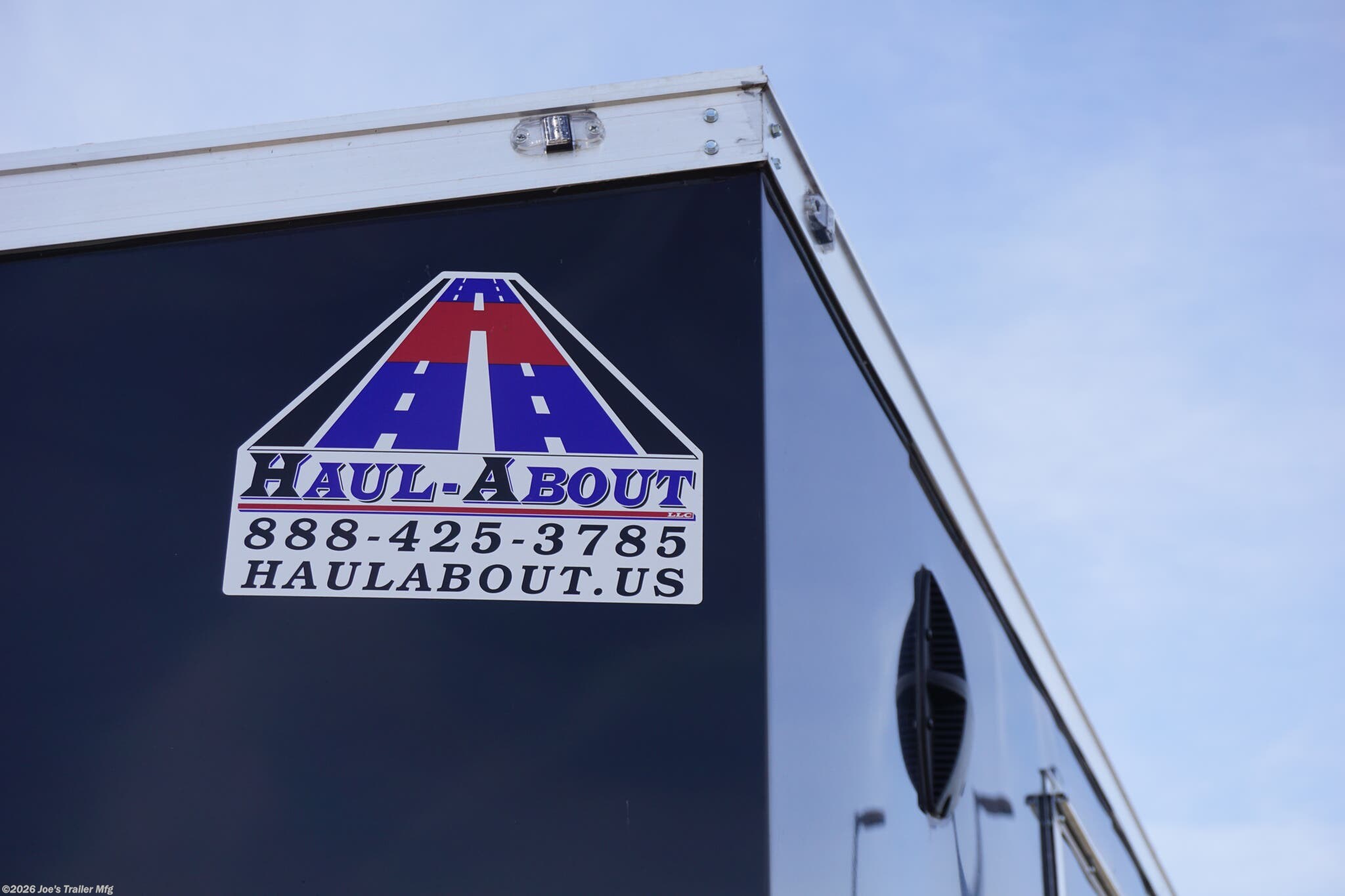 Haul-About 75” x 16’ enclosed trailer, 75” x 16’ trailer, Haul-About aluminum enclosed trailer, dual axle trailer, 2 x 3,500 lb axle trailer, aluminum cargo trailer, bumper pull enclosed trailer, black enclosed trailer, ST205/75R15 trailer tires, 15-inch trailer rims, electric brake trailer, 7,000 lb GVWR trailer, 4,314 lb payload trailer, 2,686 lb curb weight trailer, 75” wide trailer, 16’ long trailer, LED trailer lights, outside LED light with side door switch, 2,000 lb capacity D-rings, recessed floor D-rings, trailer with recessed D-rings, scoop vents trailer, trailer with flush lock, bar lock and flush lock, trailer with flip-up door, UTV trailer, enclosed UTV trailer, trailer for UTV