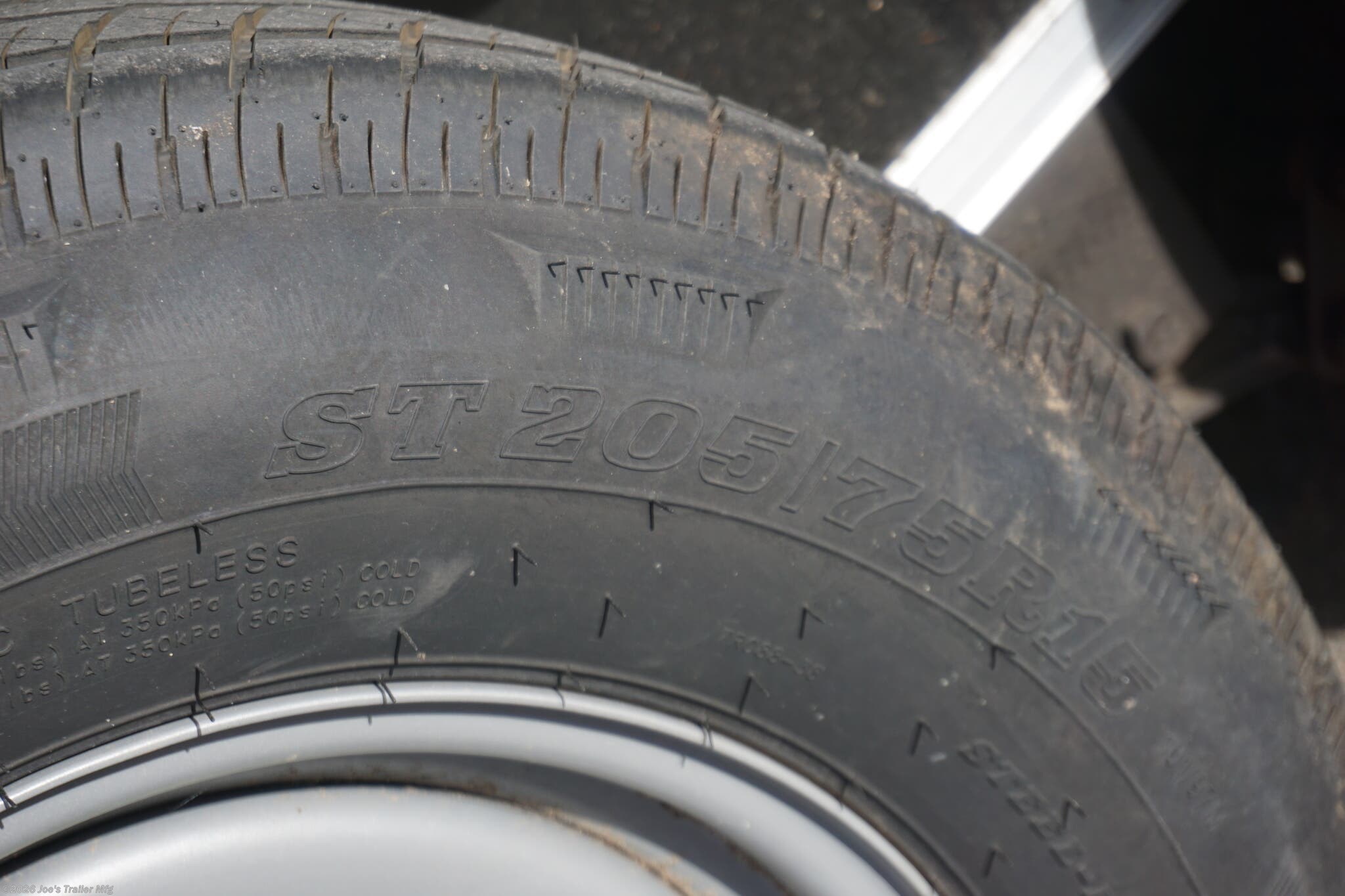 Haul-About 75” x 16’ enclosed trailer, 75” x 16’ trailer, Haul-About aluminum enclosed trailer, dual axle trailer, 2 x 3,500 lb axle trailer, aluminum cargo trailer, bumper pull enclosed trailer, black enclosed trailer, ST205/75R15 trailer tires, 15-inch trailer rims, electric brake trailer, 7,000 lb GVWR trailer, 4,314 lb payload trailer, 2,686 lb curb weight trailer, 75” wide trailer, 16’ long trailer, LED trailer lights, outside LED light with side door switch, 2,000 lb capacity D-rings, recessed floor D-rings, trailer with recessed D-rings, scoop vents trailer, trailer with flush lock, bar lock and flush lock, trailer with flip-up door, UTV trailer, enclosed UTV trailer, trailer for UTV