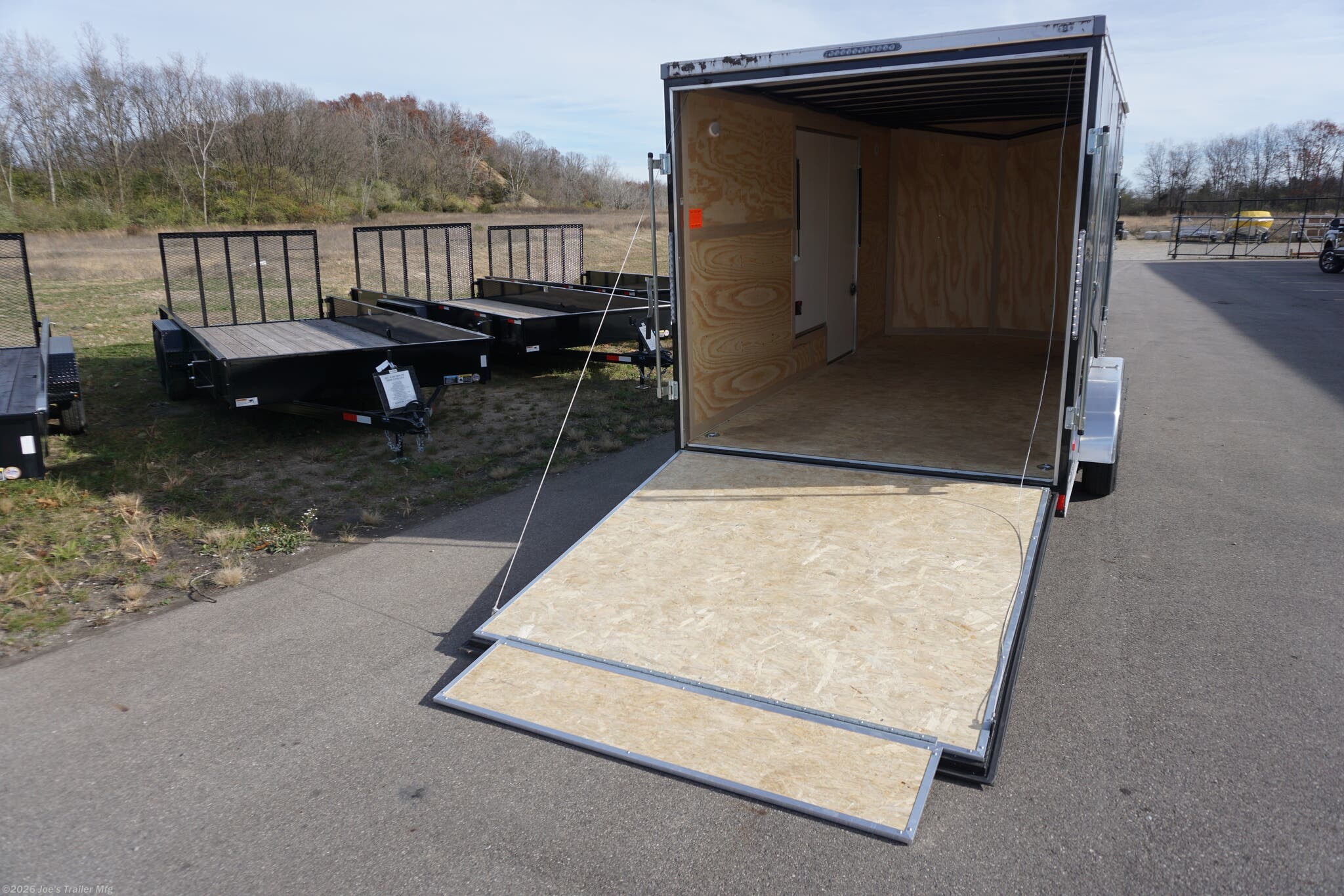 Haul-About 75” x 16’ enclosed trailer, 75” x 16’ trailer, Haul-About aluminum enclosed trailer, dual axle trailer, 2 x 3,500 lb axle trailer, aluminum cargo trailer, bumper pull enclosed trailer, black enclosed trailer, ST205/75R15 trailer tires, 15-inch trailer rims, electric brake trailer, 7,000 lb GVWR trailer, 4,314 lb payload trailer, 2,686 lb curb weight trailer, 75” wide trailer, 16’ long trailer, LED trailer lights, outside LED light with side door switch, 2,000 lb capacity D-rings, recessed floor D-rings, trailer with recessed D-rings, scoop vents trailer, trailer with flush lock, bar lock and flush lock, trailer with flip-up door, UTV trailer, enclosed UTV trailer, trailer for UTV
