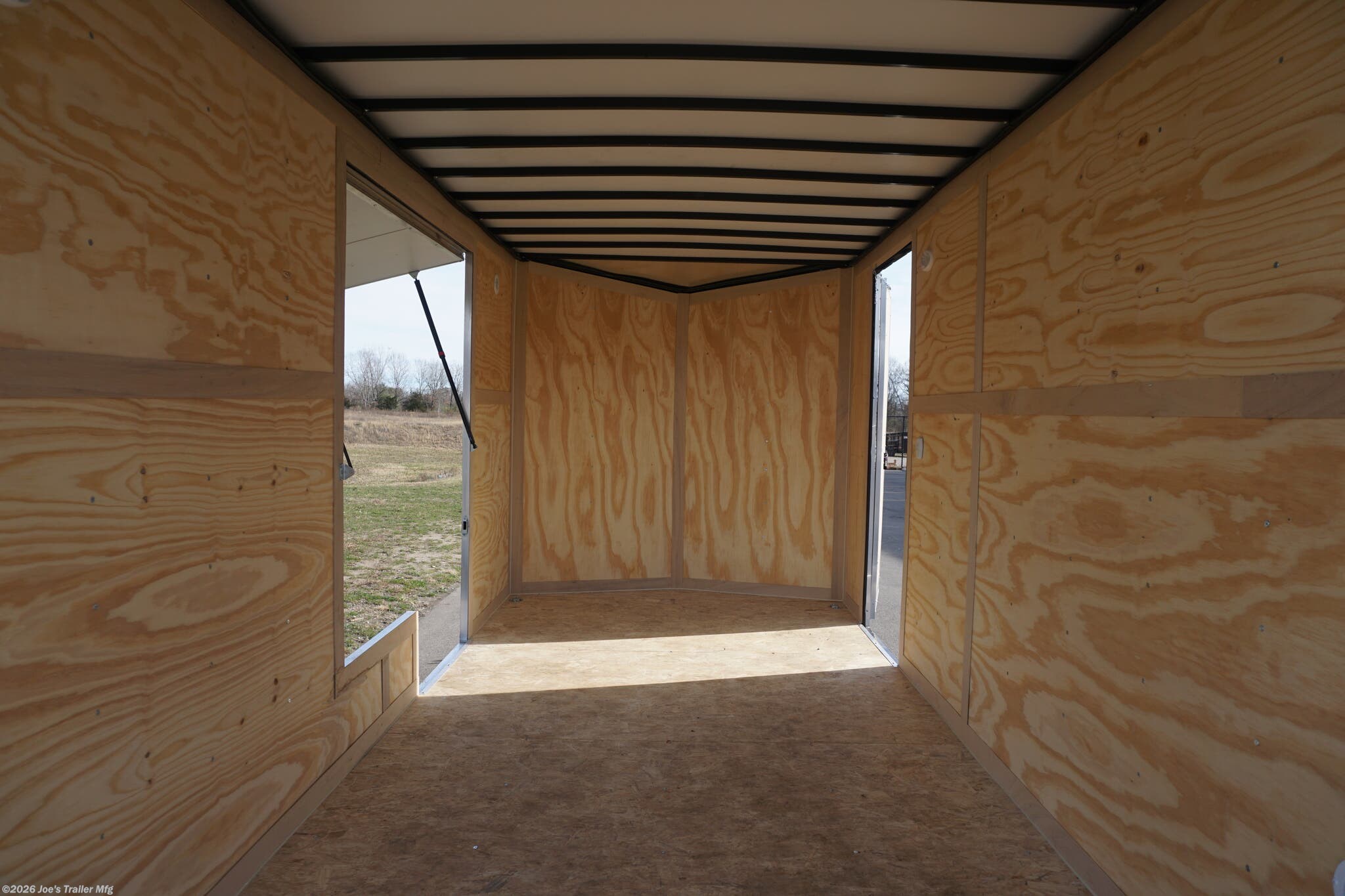 Haul-About 75” x 16’ enclosed trailer, 75” x 16’ trailer, Haul-About aluminum enclosed trailer, dual axle trailer, 2 x 3,500 lb axle trailer, aluminum cargo trailer, bumper pull enclosed trailer, black enclosed trailer, ST205/75R15 trailer tires, 15-inch trailer rims, electric brake trailer, 7,000 lb GVWR trailer, 4,314 lb payload trailer, 2,686 lb curb weight trailer, 75” wide trailer, 16’ long trailer, LED trailer lights, outside LED light with side door switch, 2,000 lb capacity D-rings, recessed floor D-rings, trailer with recessed D-rings, scoop vents trailer, trailer with flush lock, bar lock and flush lock, trailer with flip-up door, UTV trailer, enclosed UTV trailer, trailer for UTV