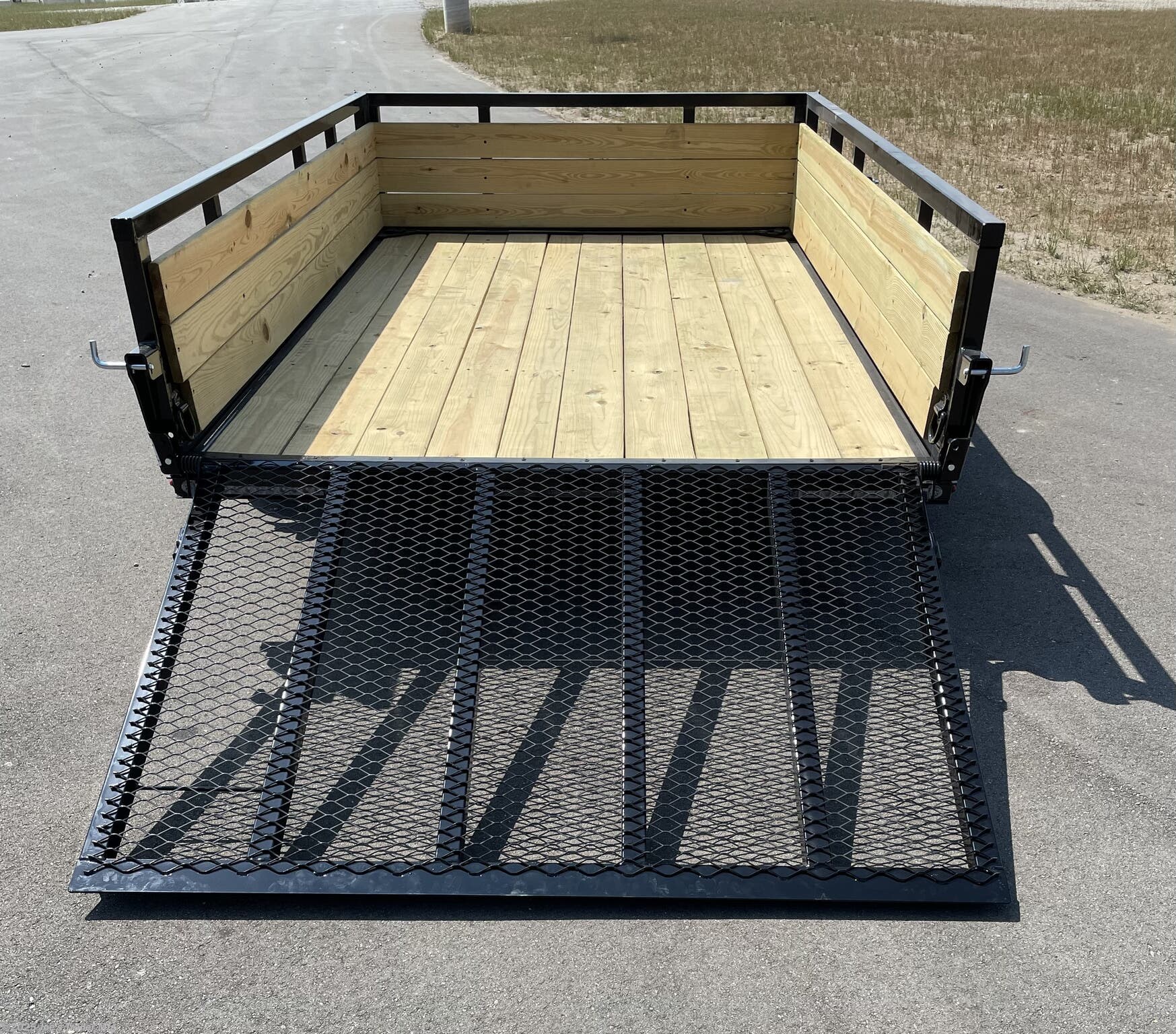 H&H 6'4"X10' 3 Board Utility Trailer, H&H Trailer, Utility Trailer, 3 Board Trailer, 6'4"X10' Trailer, 3"x2" Angle Cross Members, Angle Cross Members, Cross Members, 3 Board Treated Wood Sides, Treated Wood Sides, 2"X 1.5" Tube Sides, 4" Channel Tongue, Channel Tongue, Trailer Tongue, 2" A Frame Coupler, A Frame Coupler, 2K Set Back Jack, Set Back Jack, 2K Jack, 3K Spring Axle, Spring Axle, 3K Axle, ST205/75R15 Load Range C Tires, Load Range C Tires, Trailer Tires, 15" Trailer Tires, LED Lighting, Trailer LED Lighting, LED Lights, Pressure Treated Pine Decking, Treated Pine Decking, Pine Decking, Spring Assisted Ramp Gate 50"X55", Spring Assisted Ramp Gate, Ramp Gate, 20 1/4" Deck Height, Trailer Deck Height, Steel Tread Plate Fenders, Tread Plate Fenders, Steel Fenders, Side Mounted D-Rings, Floor Mounted D-Rings, D-Rings, Spare Tire Mount, Trailer Spare Tire Mount.