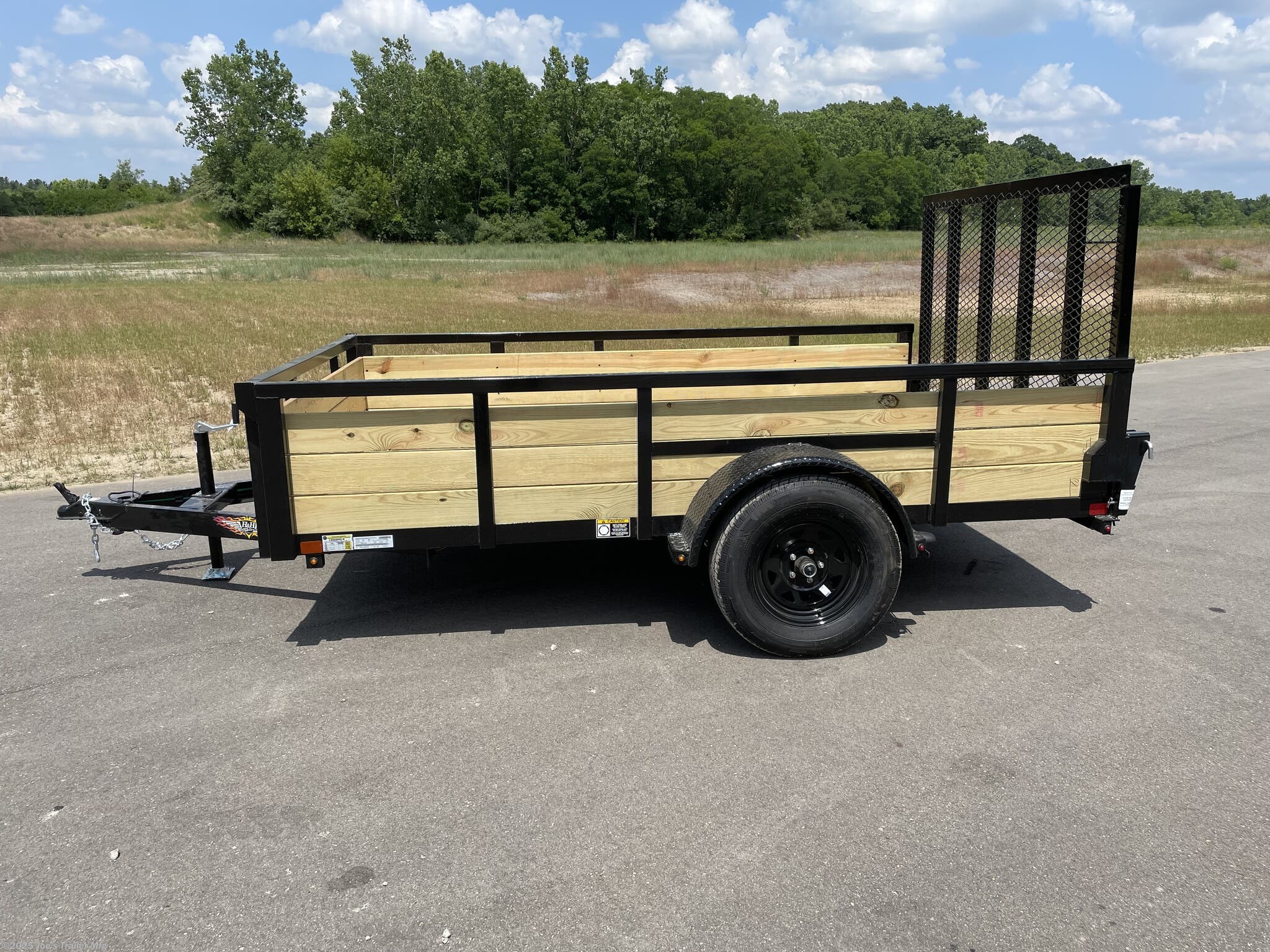 H&H 6'4"X10' 3 Board Utility Trailer, H&H Trailer, Utility Trailer, 3 Board Trailer, 6'4"X10' Trailer, 3"x2" Angle Cross Members, Angle Cross Members, Cross Members, 3 Board Treated Wood Sides, Treated Wood Sides, 2"X 1.5" Tube Sides, 4" Channel Tongue, Channel Tongue, Trailer Tongue, 2" A Frame Coupler, A Frame Coupler, 2K Set Back Jack, Set Back Jack, 2K Jack, 3K Spring Axle, Spring Axle, 3K Axle, ST205/75R15 Load Range C Tires, Load Range C Tires, Trailer Tires, 15" Trailer Tires, LED Lighting, Trailer LED Lighting, LED Lights, Pressure Treated Pine Decking, Treated Pine Decking, Pine Decking, Spring Assisted Ramp Gate 50"X55", Spring Assisted Ramp Gate, Ramp Gate, 20 1/4" Deck Height, Trailer Deck Height, Steel Tread Plate Fenders, Tread Plate Fenders, Steel Fenders, Side Mounted D-Rings, Floor Mounted D-Rings, D-Rings, Spare Tire Mount, Trailer Spare Tire Mount.