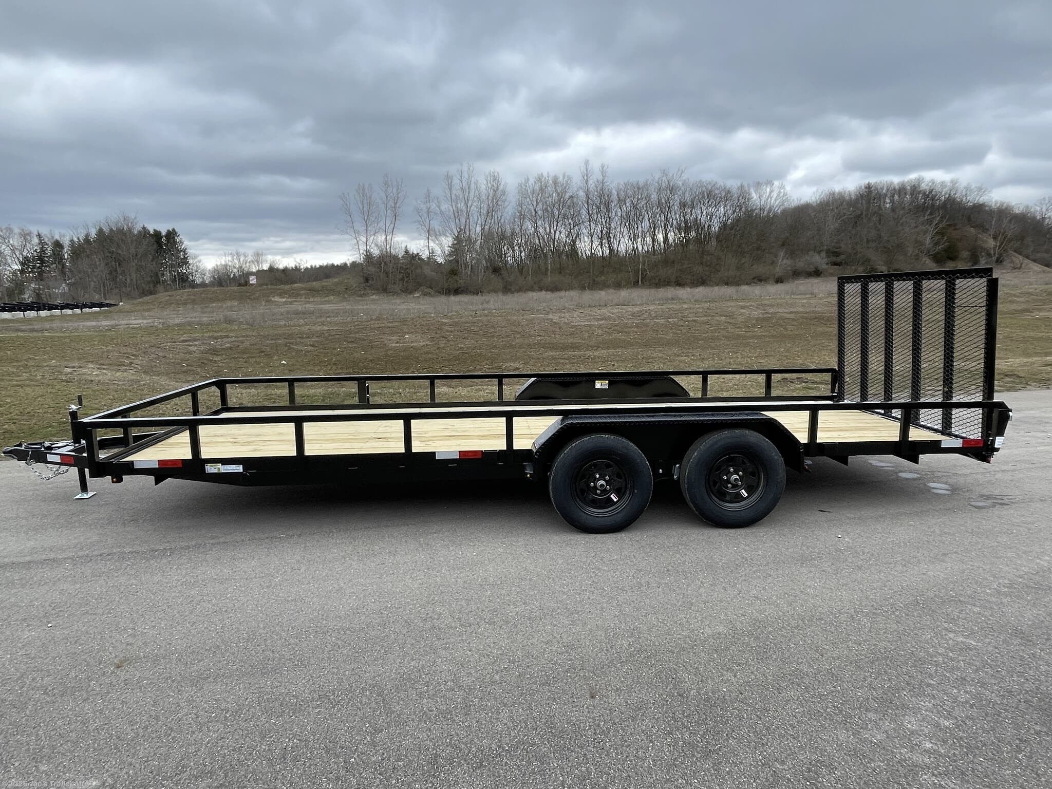 H&H 82" x 20' Landscape Utility Trailer, 3" x 2" x 3/16" Steel Angle Frame, Single Axle Utility Trailer, 4" x 3" x 1/4" Steel Angle Frame, Tandem Axle Utility Trailer, 3" x 2" x 3/16" Steel Angle Crossmembers, 4" Steel Channel Tongue, 2" x 1-1/2" Steel Tube Uprights, 2" x 2" Steel Tube Top Rail, 2" A-Frame Posi-Lock Coupler, Single Axle Coupler, 2-5/16" A-Frame Posi-Lock Coupler, Tandem Axle Coupler, Dual Safety Chains and Hooks, 4-Prong Plug Trailer, 7-Way RV-Style Plug, Enclosed Sealed Wiring Harness, 2k Rated Setback Jack, Spring Assisted Gate, 50" Tall Gate, Grab Handle Gate, Radius Tread Plate Fenders, Steel Formed Tread Plate Fenders, Single Spring Idler Suspension, 2990 lb. GVWR, Tandem Spring Brake Suspension, 7000 lb. GVWR, Easy Lube Hubs, ST205/75R15 'C' Tires, 15" Black Steel Wheels, High Gloss Powder Coat Finish, 2 x 8 Pressure Treated Pine Decking, Welded Front Board Retainer, Rear End Board Cap, Stake Pockets Trailer, Spare Tire Mount, Full LED DOT Compliant Lighting.