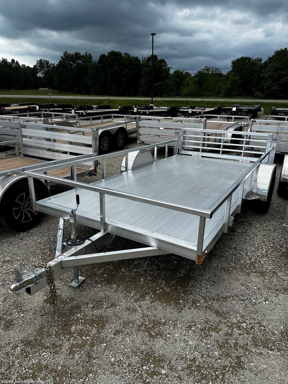 Legend 7X14' Open Deluxe Utility Trailer, 17" Deck Height Utility Trailer, 48" Bi Fold Ramp Gate Trailer, 3.5k EZ-Lube Spring Axle Trailer, ST205/75R14 Silver Mod Steel Tires, 3" Tube Cross Members Trailer, 24" On Center Cross Member Spacing, 4" Tube Frame Utility Trailer, Aluminum Flooring Trailer, LED Lighting Utility Trailer, 2" Straight Coupler Trailer, 2k Top-Wind Jack Utility Trailer, ATP Fenders Trailer, Stake Pockets Utility Trailer, Heavy Duty Utility Trailer, Open Utility Trailer 7X14, Deluxe Utility Trailer with Ramp Gate, Spring Axle Utility Trailer, Steel Tires Utility Trailer, Tube Cross Members Utility Trailer, Cross Member Spacing Utility Trailer, Tube Frame Trailer, Flooring Aluminum Trailer, LED Lights Utility Trailer, Coupler Trailer Parts, Top-Wind Jack Utility Trailer, Fenders ATP Utility Trailer, Stake Pockets Utility Trailer Features