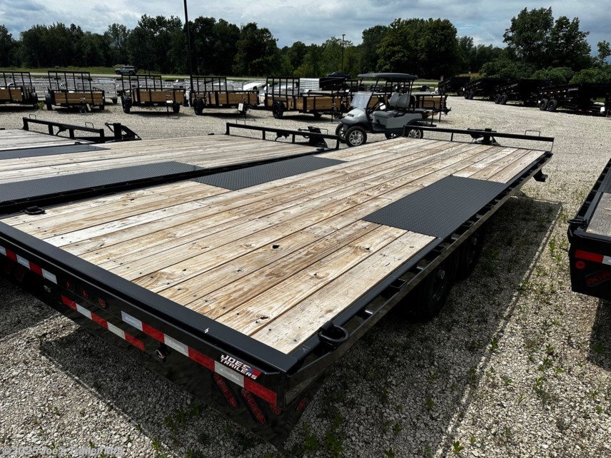 Legend - Tandem Axle: FDP 102 x 22, 10” I-Beam Frame and Tongue, 2 5/16” Adjustable Coupler, 16” Structural Crossmembers, Deck Height 33”, Rub Rail, Stake Pockets & Pipe Spools, Cambered Spring Axles, Multi-leaf Slipper Spring Suspension, E-Z Lube Hubs, 2 Electric Brake Axles, Full 102’ Wide Deckover, Slide in Ramps, 10k Drop-Leg Jack, Treated Pine 2x8 Floor, 4 Standard 3” D-Rings, 235/80R16 Radial Tires with 8 Hole Wheel, Lifetime LED Lighting, All Lighting DOT Approved, Molded Sealed Harness with Resistors, 7-Way Receiver Female Plug with Adapter
