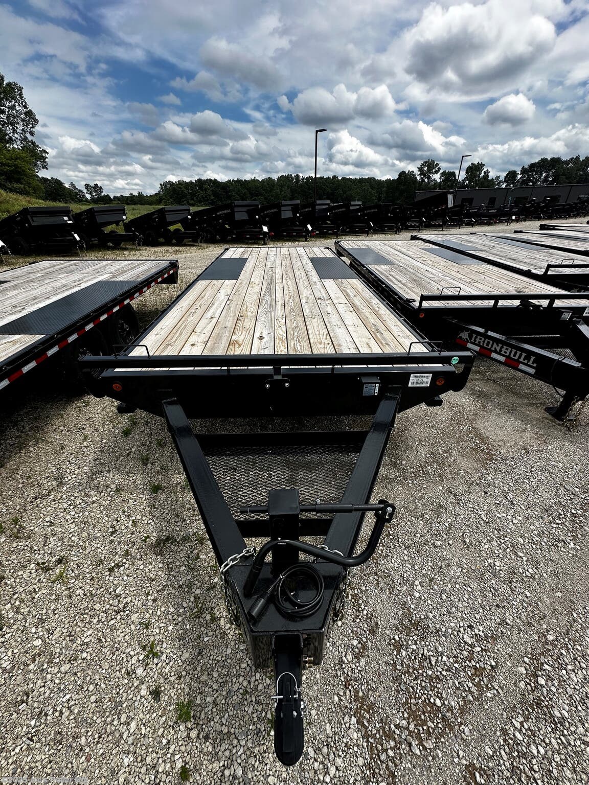 Legend - Tandem Axle: FDP 102 x 22, 10” I-Beam Frame and Tongue, 2 5/16” Adjustable Coupler, 16” Structural Crossmembers, Deck Height 33”, Rub Rail, Stake Pockets & Pipe Spools, Cambered Spring Axles, Multi-leaf Slipper Spring Suspension, E-Z Lube Hubs, 2 Electric Brake Axles, Full 102’ Wide Deckover, Slide in Ramps, 10k Drop-Leg Jack, Treated Pine 2x8 Floor, 4 Standard 3” D-Rings, 235/80R16 Radial Tires with 8 Hole Wheel, Lifetime LED Lighting, All Lighting DOT Approved, Molded Sealed Harness with Resistors, 7-Way Receiver Female Plug with Adapter