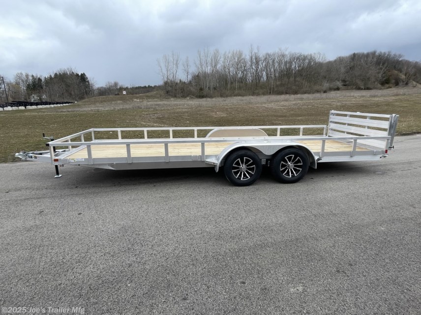 Aluminum Rail Side Tandem Utility Trailer H8218TRSA H&H Aluminum Rail Side Utility, aluminum angle extrusion frame, 3" x 2" aluminum frame, 3" aluminum channel crossmembers, tandem axle trailer, 5" aluminum triple tube tongue, 2" x 1-1/2" aluminum uprights, 2" x 2" aluminum top rail, 2-5/16" A-Frame posi-lock coupler, dual safety chains and hooks, 7-way RV-style plug, sealed wiring harness, 2k rated setback jack, 54" aluminum bi-fold gate, aluminum teardrop fenders, tandem spring brake suspension, 7000 lb GVWR, easy lube hubs, ST205/75R15 C tires, 15" aluminum wheels, 2 x 8 pressure treated pine decking, front and rear end board caps, aluminum stake pockets, full LED DOT compliant lighting, load angle and ramp length, 17° load angle, 58" ramp length, ramp pivot point, aluminum utility trailer, H&H utility trailer, aluminum rail side trailer, aluminum trailer with stake pockets, tandem axle utility trailer, aluminum deck trailer, aluminum fender trailer, DOT compliant utility trailer, a