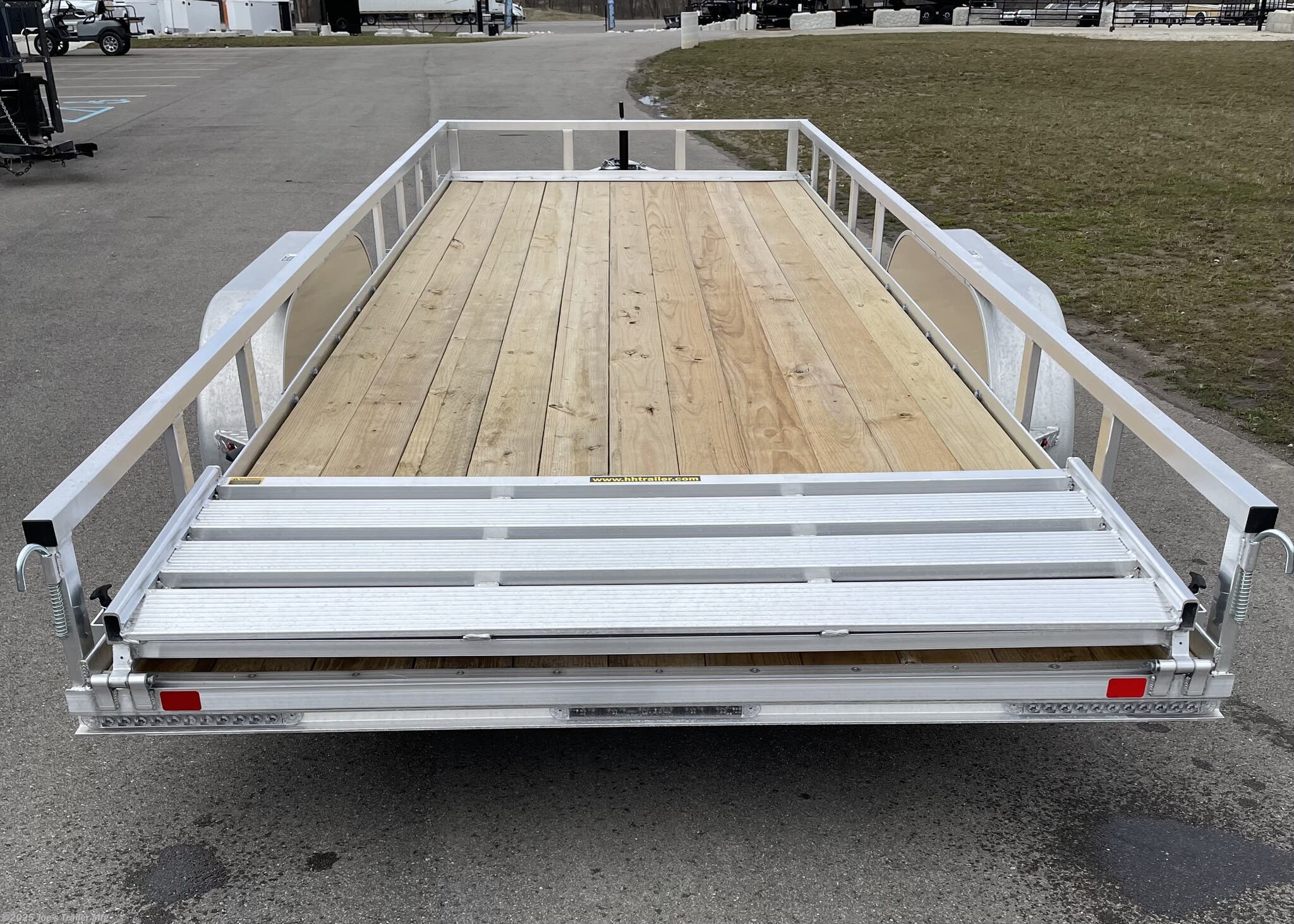 Landscape Trailer H8220TRSA H&H Aluminum Rail Side Utility Trailer, 3" x 2" Aluminum Angle Extrusion Frame, 3" Aluminum Channel Crossmembers, Tandem Axle Utility Trailer, 5" Aluminum Triple Tube Tongue, 2" x 1-1/2" Aluminum Extrusion Tube Uprights, 2" x 2" Aluminum Tube Top Rail, 2-5/16" A-Frame Posi-Lock Coupler, Dual Safety Chains and Hooks, 7-Way RV-Style Plug, Sealed Wiring Harness, 2k Rated Setback Jack, 54" Aluminum Bi-Fold Gate, Aluminum Teardrop Fenders, Tandem Spring Brake Suspension, 7000 lb GVWR Tandem Axle, Easy Lube Hubs, ST205/75R15 'C' Tires, 15" Aluminum Wheels, 2 x 8 Pressure Treated Pine Decking, Front & Rear End Board Caps, Aluminum Stake Pockets, Full LED DOT Compliant Lighting, Load Angle, Ramp Length, Load Angle 17°, Ramp Length 58", Aluminum Utility Trailer Features, Heavy-Duty Aluminum Trailer, Lightweight Aluminum Trailer, Durable Aluminum Utility Trailer, High-Performance Utility Trailer, H&H Aluminum Utility Trailer, Tandem Axle Trailer, Utility Trailer with