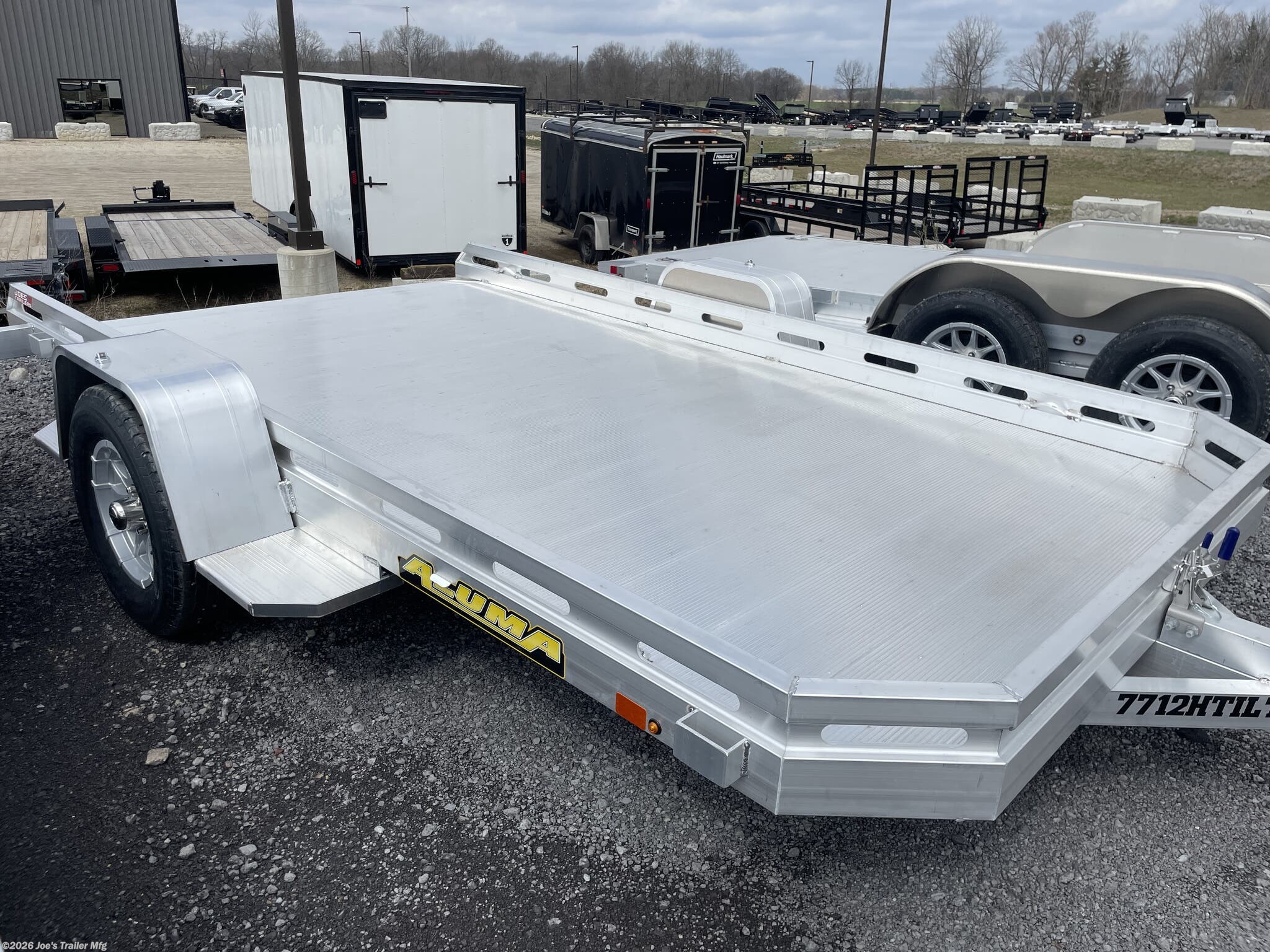 New 2026 Aluma 77x12 2990 GVWR Aluminum Tilt Utility Trailer available in Clarklake, Michigan