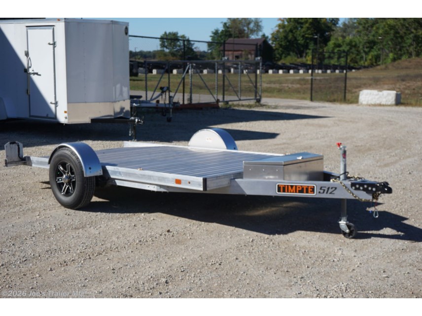 2024 Timpte 0512TSEZ Utility Trailer, Timpte trailers, utility trailer specifications, 5,000 lbs GVWR trailer, heavy-duty trailer, EZ Loader Drop Deck System, wireless remote trailer, vehicle hauling trailer, equipment transport trailer, material transport trailer, durable utility trailer, trailer with torsion axle, trailer with electric self-adjusting brakes, radial tire trailer, ST225/75R15 radial tires, full LED lighting trailer, Wilmington NC trailer, new utility trailer for sale, 144-inch trailer length, 75-inch trailer width, 2,000 lbs top wind jack, 2 5/16" coupler trailer, bumper pull hitch type, trailer with 4 D rings, high-quality material trailer, weather-resistant trailer, trailer with precision engineering, Wilmington trailer dealer, 2024 trailer models, GVWR trailer, one axle trailer, utility trailer with wireless remote, reliable hauling trailer, best trailer for heavy loads, Timpte 2024 trailer lineup, self-adjusting brakes trailer, trailer with full LED package, Wilmin 2024 Timpte 0512TSEZ Utility Trailer, Timpte trailers, utility trailer specifications, 5,000 lbs GVWR trailer, heavy-duty trailer, EZ Loader Drop Deck System, wireless remote trailer, vehicle hauling trailer, equipment transport trailer, material transport trailer, durable utility trailer, trailer with torsion axle, trailer with electric self-adjusting brakes, radial tire trailer, ST225/75R15 radial tires, full LED lighting trailer, Wilmington NC trailer, new utility trailer for sale, 144-inch trailer length, 75-inch trailer width, 2,000 lbs top wind jack, 2 5/16" coupler trailer, bumper pull hitch type, trailer with 4 D rings, high-quality material trailer, weather-resistant trailer, trailer with precision engineering, Wilmington trailer dealer, 2024 trailer models, GVWR trailer, one axle trailer, utility trailer with wireless remote, reliable hauling trailer, best trailer for heavy loads, Timpte 2024 trailer lineup, self-adjusting brakes trailer, trailer with full LED package, Wilmin