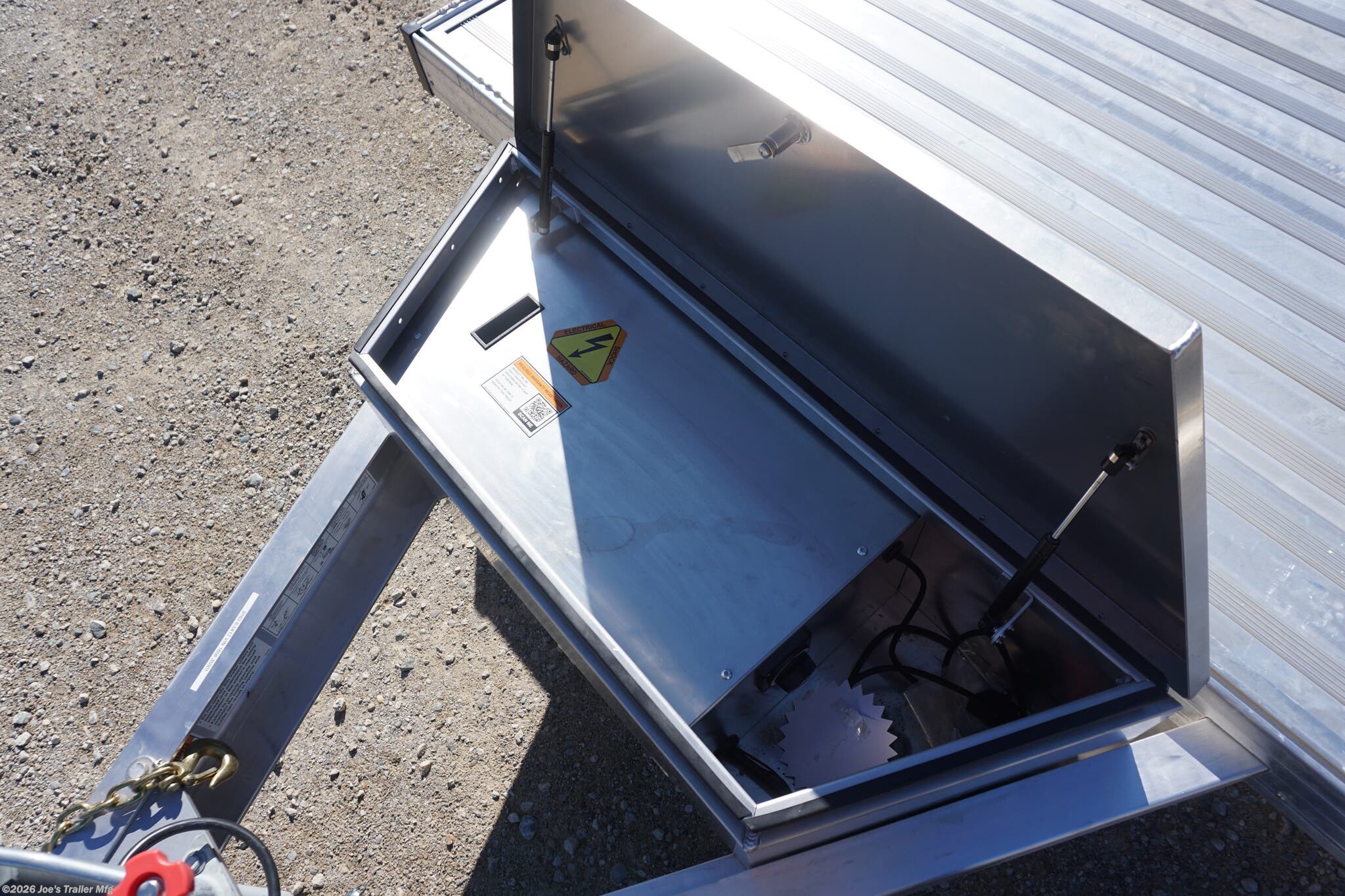 2024 Timpte 0512TSEZ Utility Trailer, Timpte trailers, utility trailer specifications, 5,000 lbs GVWR trailer, heavy-duty trailer, EZ Loader Drop Deck System, wireless remote trailer, vehicle hauling trailer, equipment transport trailer, material transport trailer, durable utility trailer, trailer with torsion axle, trailer with electric self-adjusting brakes, radial tire trailer, ST225/75R15 radial tires, full LED lighting trailer, Wilmington NC trailer, new utility trailer for sale, 144-inch trailer length, 75-inch trailer width, 2,000 lbs top wind jack, 2 5/16" coupler trailer, bumper pull hitch type, trailer with 4 D rings, high-quality material trailer, weather-resistant trailer, trailer with precision engineering, Wilmington trailer dealer, 2024 trailer models, GVWR trailer, one axle trailer, utility trailer with wireless remote, reliable hauling trailer, best trailer for heavy loads, Timpte 2024 trailer lineup, self-adjusting brakes trailer, trailer with full LED package, Wilmin