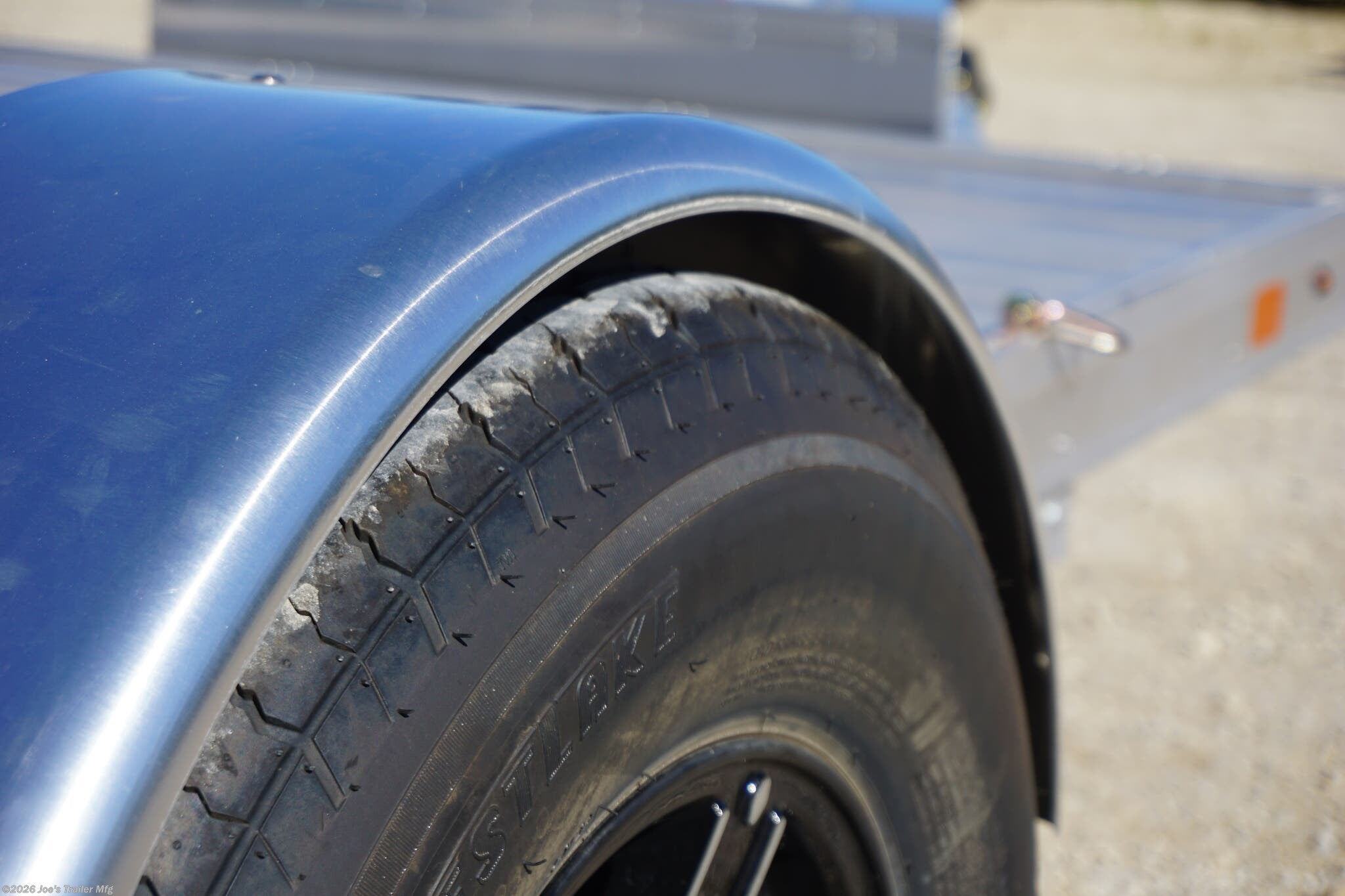 2024 Timpte 0512TSEZ Utility Trailer, Timpte trailers, utility trailer specifications, 5,000 lbs GVWR trailer, heavy-duty trailer, EZ Loader Drop Deck System, wireless remote trailer, vehicle hauling trailer, equipment transport trailer, material transport trailer, durable utility trailer, trailer with torsion axle, trailer with electric self-adjusting brakes, radial tire trailer, ST225/75R15 radial tires, full LED lighting trailer, Wilmington NC trailer, new utility trailer for sale, 144-inch trailer length, 75-inch trailer width, 2,000 lbs top wind jack, 2 5/16" coupler trailer, bumper pull hitch type, trailer with 4 D rings, high-quality material trailer, weather-resistant trailer, trailer with precision engineering, Wilmington trailer dealer, 2024 trailer models, GVWR trailer, one axle trailer, utility trailer with wireless remote, reliable hauling trailer, best trailer for heavy loads, Timpte 2024 trailer lineup, self-adjusting brakes trailer, trailer with full LED package, Wilmin