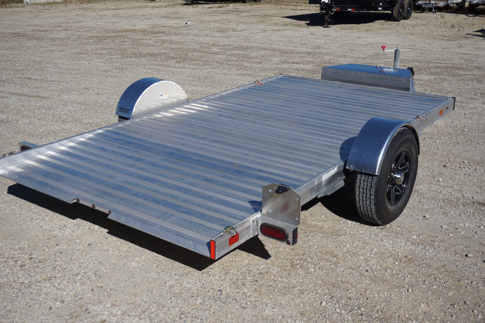 2024 Timpte 0512TSEZ Utility Trailer, Timpte trailers, utility trailer specifications, 5,000 lbs GVWR trailer, heavy-duty trailer, EZ Loader Drop Deck System, wireless remote trailer, vehicle hauling trailer, equipment transport trailer, material transport trailer, durable utility trailer, trailer with torsion axle, trailer with electric self-adjusting brakes, radial tire trailer, ST225/75R15 radial tires, full LED lighting trailer, Wilmington NC trailer, new utility trailer for sale, 144-inch trailer length, 75-inch trailer width, 2,000 lbs top wind jack, 2 5/16" coupler trailer, bumper pull hitch type, trailer with 4 D rings, high-quality material trailer, weather-resistant trailer, trailer with precision engineering, Wilmington trailer dealer, 2024 trailer models, GVWR trailer, one axle trailer, utility trailer with wireless remote, reliable hauling trailer, best trailer for heavy loads, Timpte 2024 trailer lineup, self-adjusting brakes trailer, trailer with full LED package, Wilmin