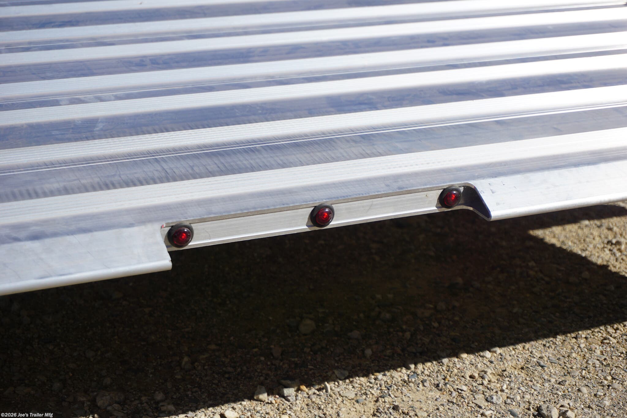 2024 Timpte 0512TSEZ Utility Trailer, Timpte trailers, utility trailer specifications, 5,000 lbs GVWR trailer, heavy-duty trailer, EZ Loader Drop Deck System, wireless remote trailer, vehicle hauling trailer, equipment transport trailer, material transport trailer, durable utility trailer, trailer with torsion axle, trailer with electric self-adjusting brakes, radial tire trailer, ST225/75R15 radial tires, full LED lighting trailer, Wilmington NC trailer, new utility trailer for sale, 144-inch trailer length, 75-inch trailer width, 2,000 lbs top wind jack, 2 5/16" coupler trailer, bumper pull hitch type, trailer with 4 D rings, high-quality material trailer, weather-resistant trailer, trailer with precision engineering, Wilmington trailer dealer, 2024 trailer models, GVWR trailer, one axle trailer, utility trailer with wireless remote, reliable hauling trailer, best trailer for heavy loads, Timpte 2024 trailer lineup, self-adjusting brakes trailer, trailer with full LED package, Wilmin