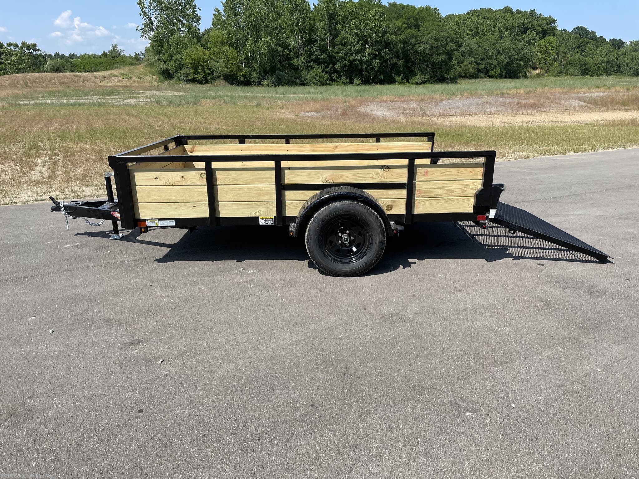 H&H 6'4"X10' 3 Board Utility Trailer, H&H Trailer, Utility Trailer, 3 Board Trailer, 6'4"X10' Trailer, 3"x2" Angle Cross Members, Angle Cross Members, Cross Members, 3 Board Treated Wood Sides, Treated Wood Sides, 2"X 1.5" Tube Sides, 4" Channel Tongue, Channel Tongue, Trailer Tongue, 2" A Frame Coupler, A Frame Coupler, 2K Set Back Jack, Set Back Jack, 2K Jack, 3K Spring Axle, Spring Axle, 3K Axle, ST205/75R15 Load Range C Tires, Load Range C Tires, Trailer Tires, 15" Trailer Tires, LED Lighting, Trailer LED Lighting, LED Lights, Pressure Treated Pine Decking, Treated Pine Decking, Pine Decking, Spring Assisted Ramp Gate 50"X55", Spring Assisted Ramp Gate, Ramp Gate, 20 1/4" Deck Height, Trailer Deck Height, Steel Tread Plate Fenders, Tread Plate Fenders, Steel Fenders, Side Mounted D-Rings, Floor Mounted D-Rings, D-Rings, Spare Tire Mount, Trailer Spare Tire Mount.